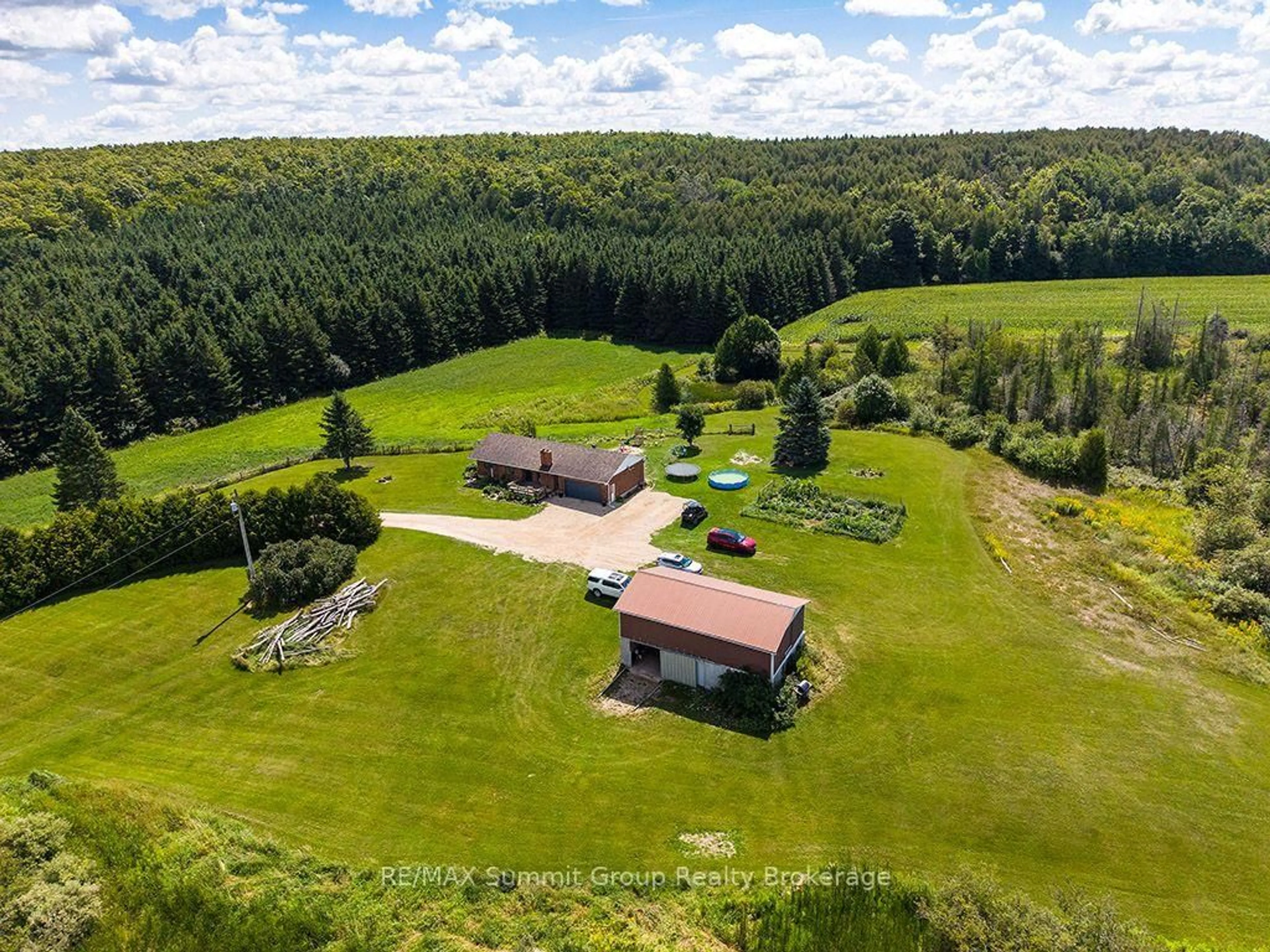 A pic from outside/outdoor area/front of a property/back of a property/a pic from drone, forest/trees view for 449686 10th Concession Rd, Grey Highlands Ontario N0C 1M0