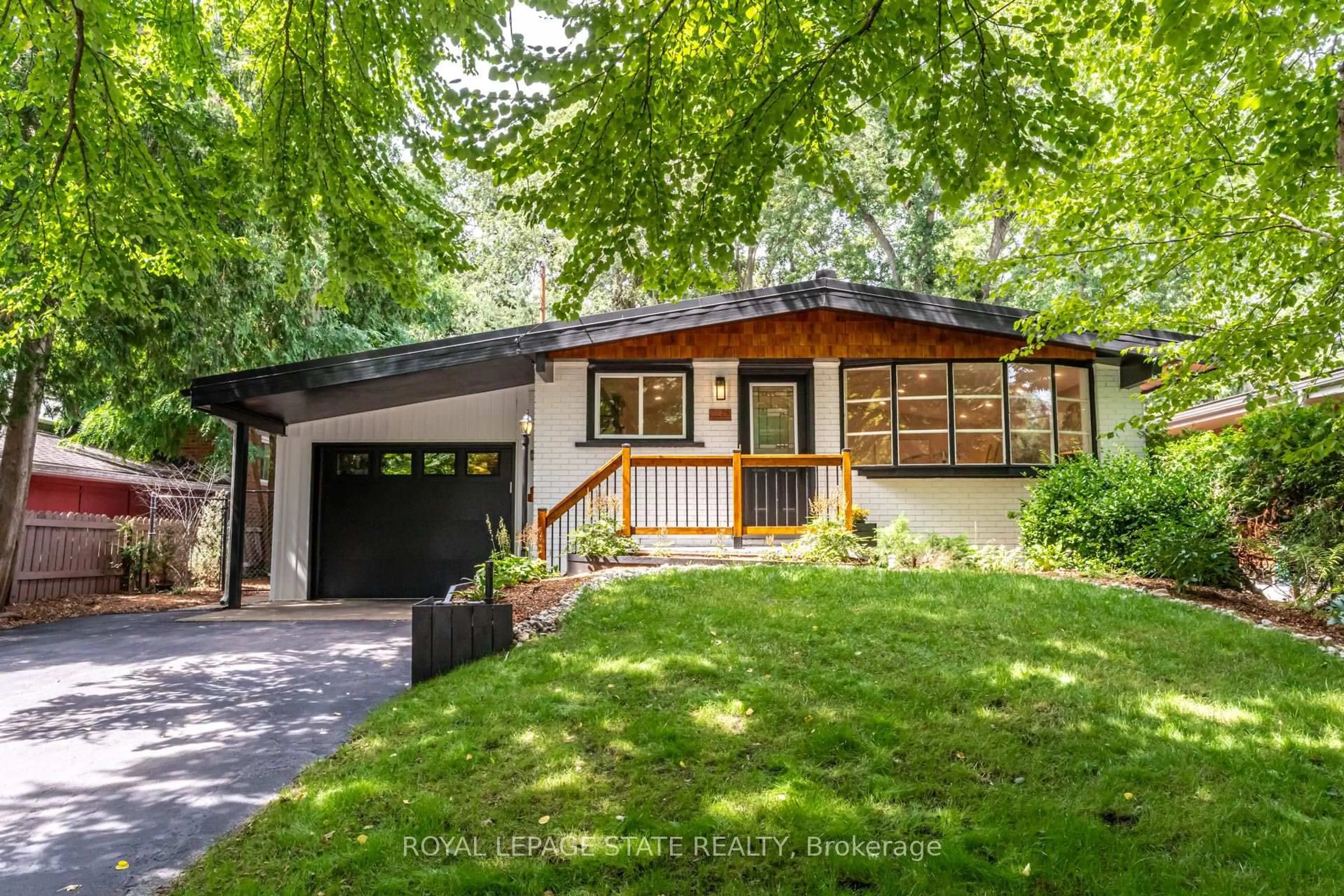 Home with vinyl exterior material, street for 28 Helen St, Hamilton Ontario L9H 1N3