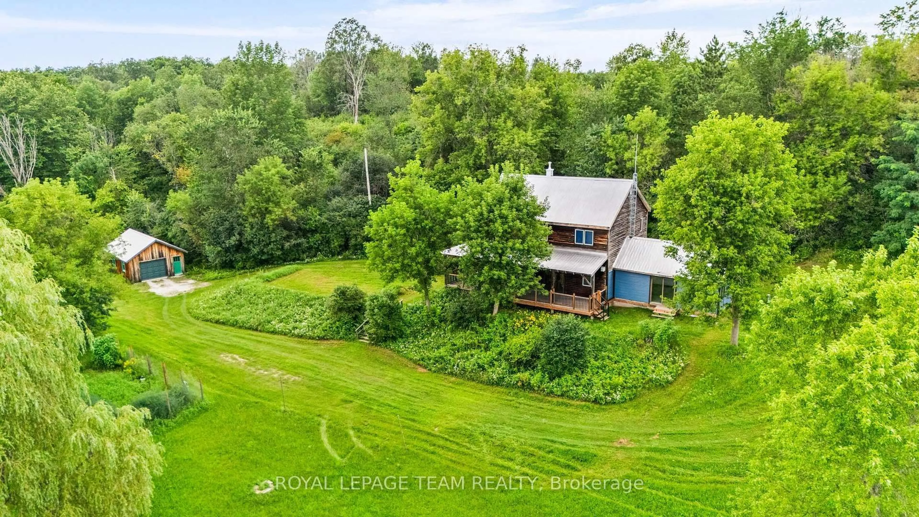 A pic from outside/outdoor area/front of a property/back of a property/a pic from drone, water/lake/river/ocean view for 1776 Old Brooke Rd, Maberly Ontario K0H 2B0