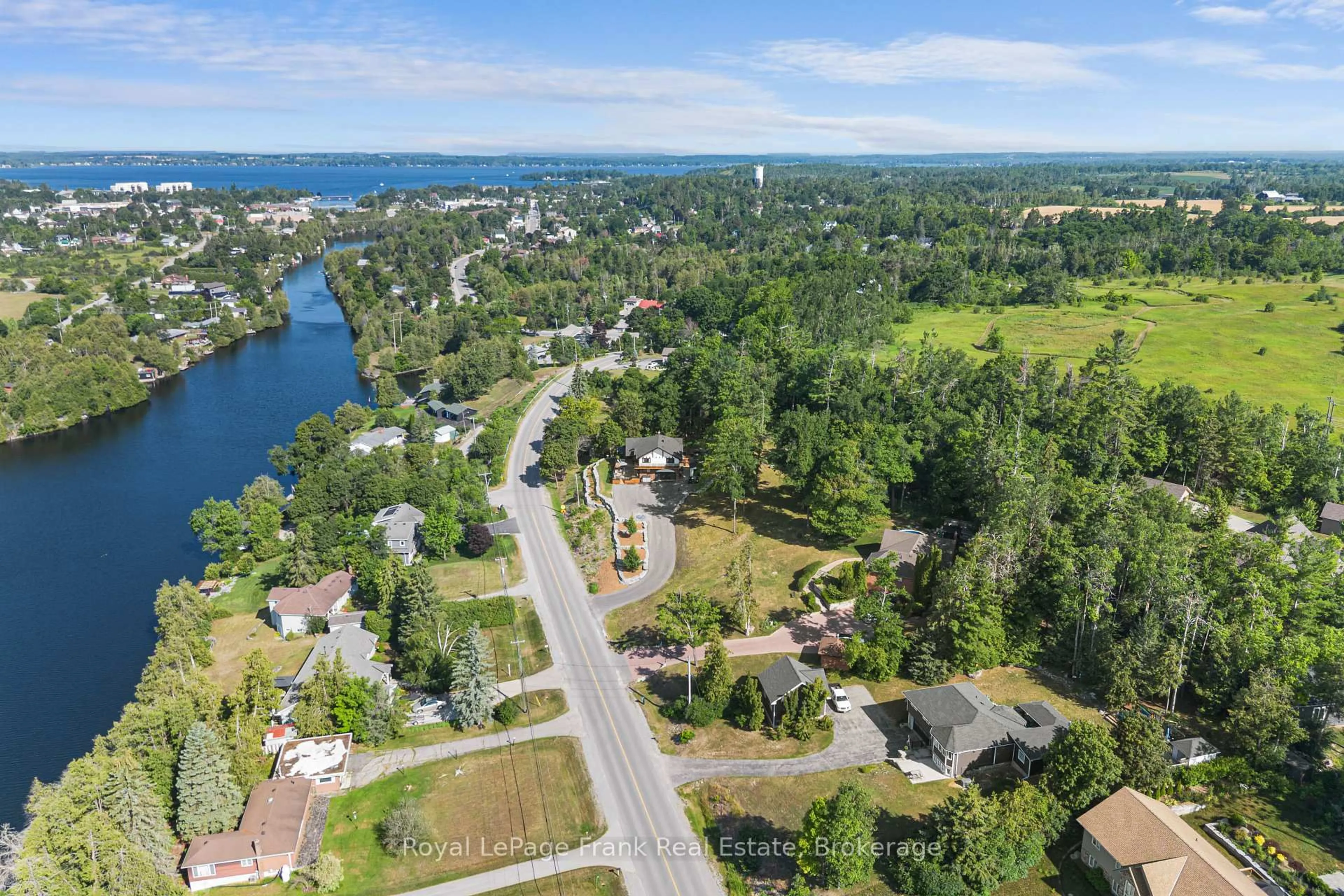 A pic from outside/outdoor area/front of a property/back of a property/a pic from drone, water/lake/river/ocean view for 215 Francis St, Kawartha Lakes Ontario K0M 1N0