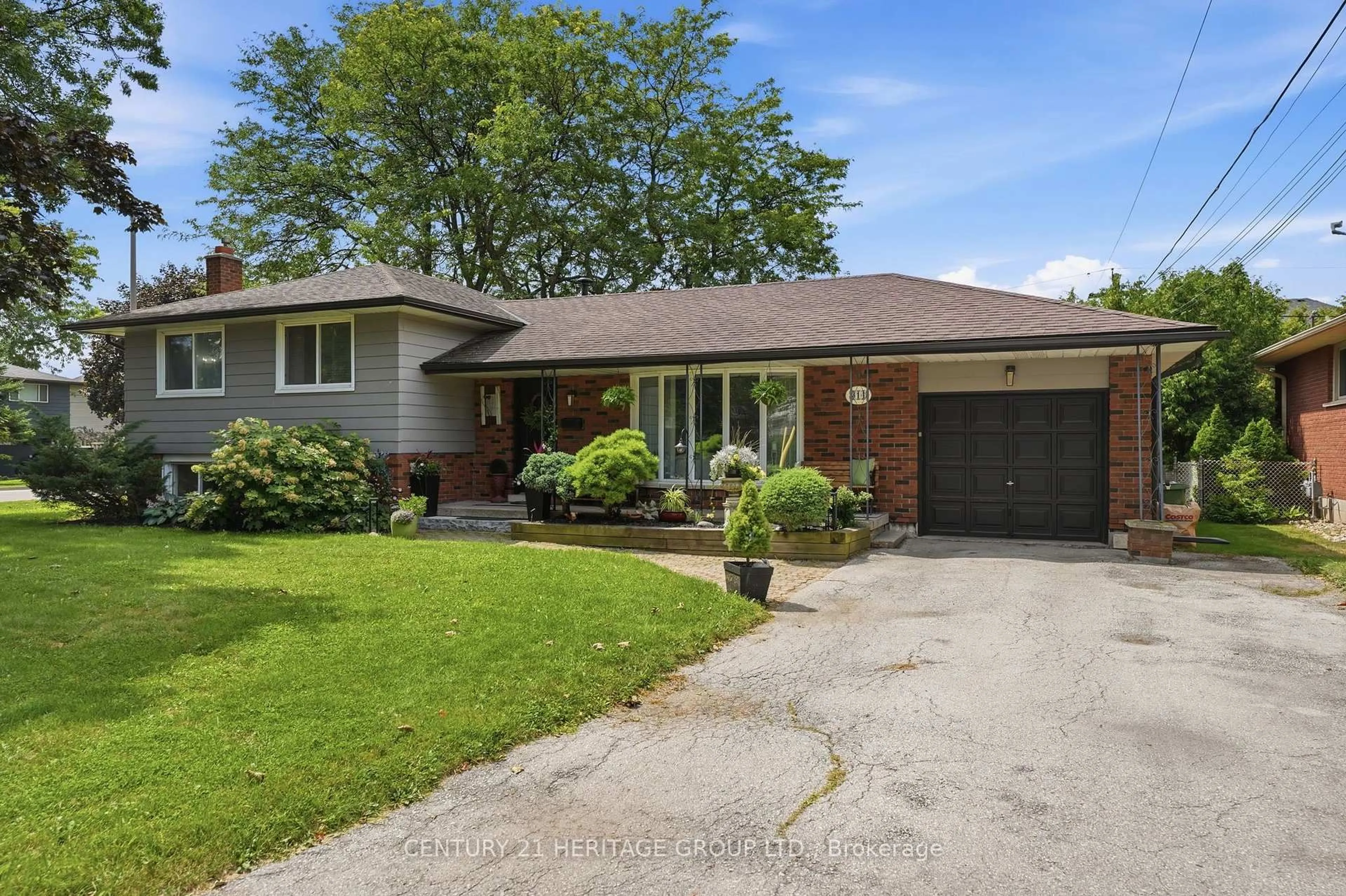 Home with brick exterior material, street for 314 Harmony Rd, Hamilton Ontario L8G 2T2