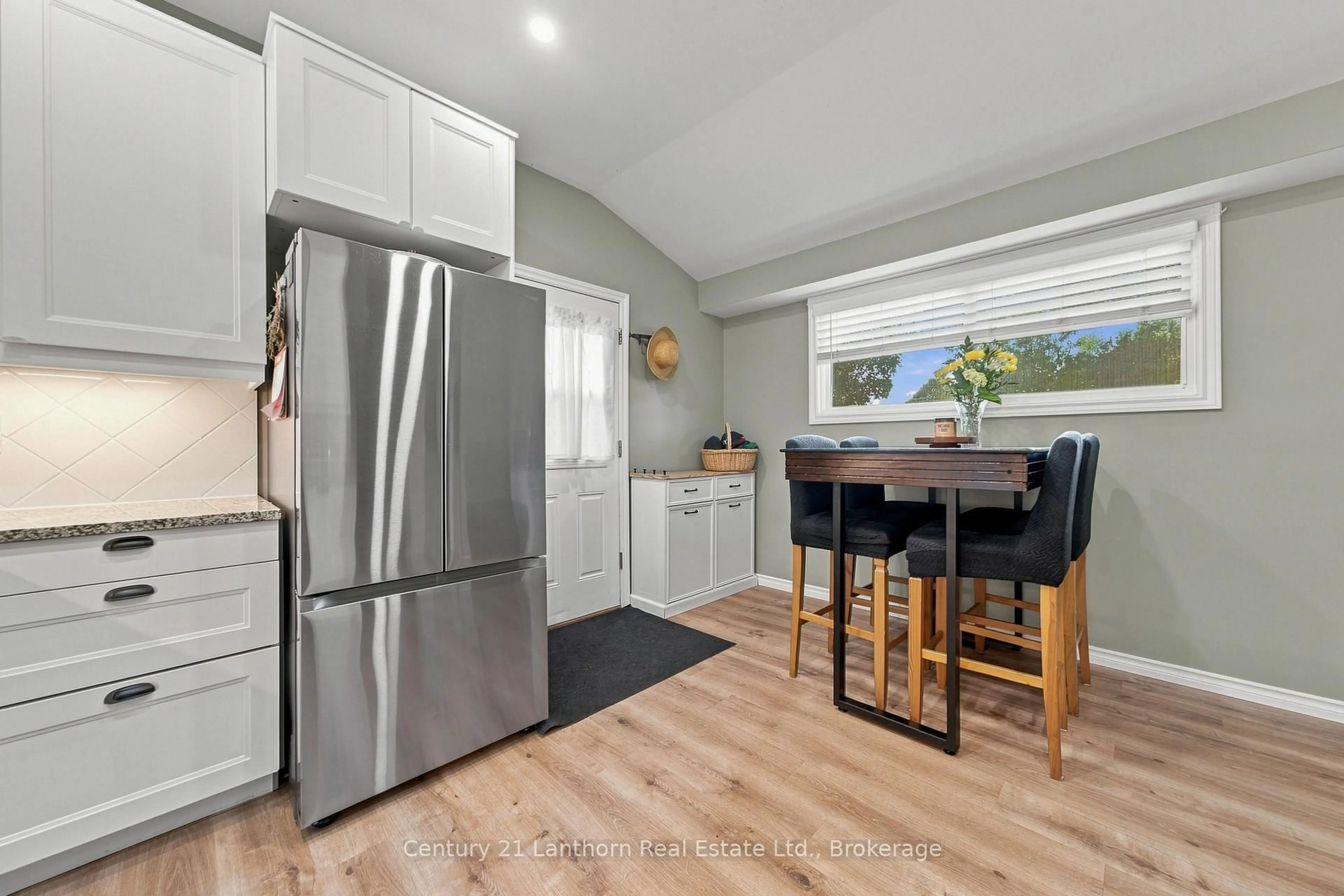 Open concept kitchen, wood/laminate floor for 169 Farley Ave, Belleville Ontario K8N 4L3