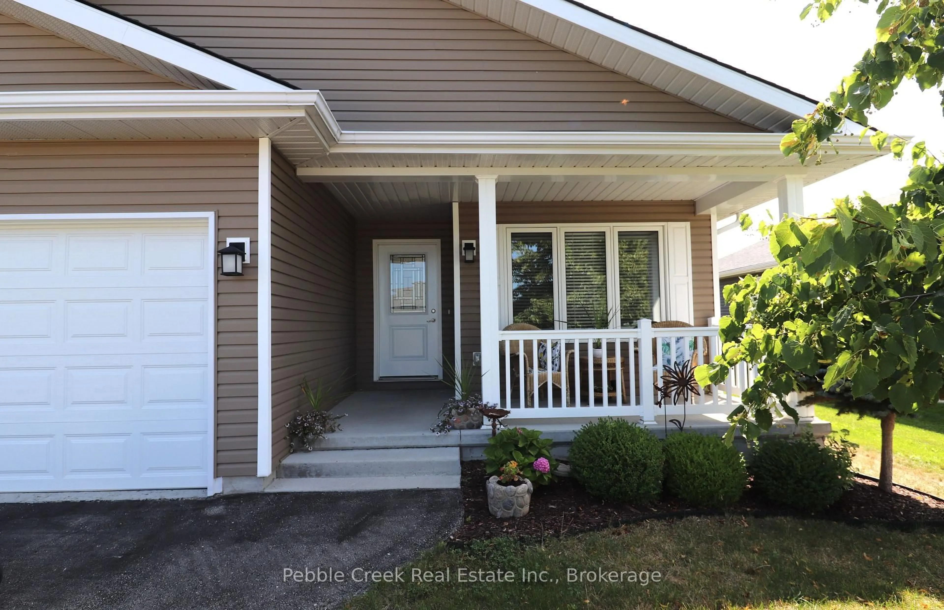 Home with vinyl exterior material, street for 20 Huron Heights Dr, Ashfield-Colborne-Wawanosh Ontario N7A 0B1
