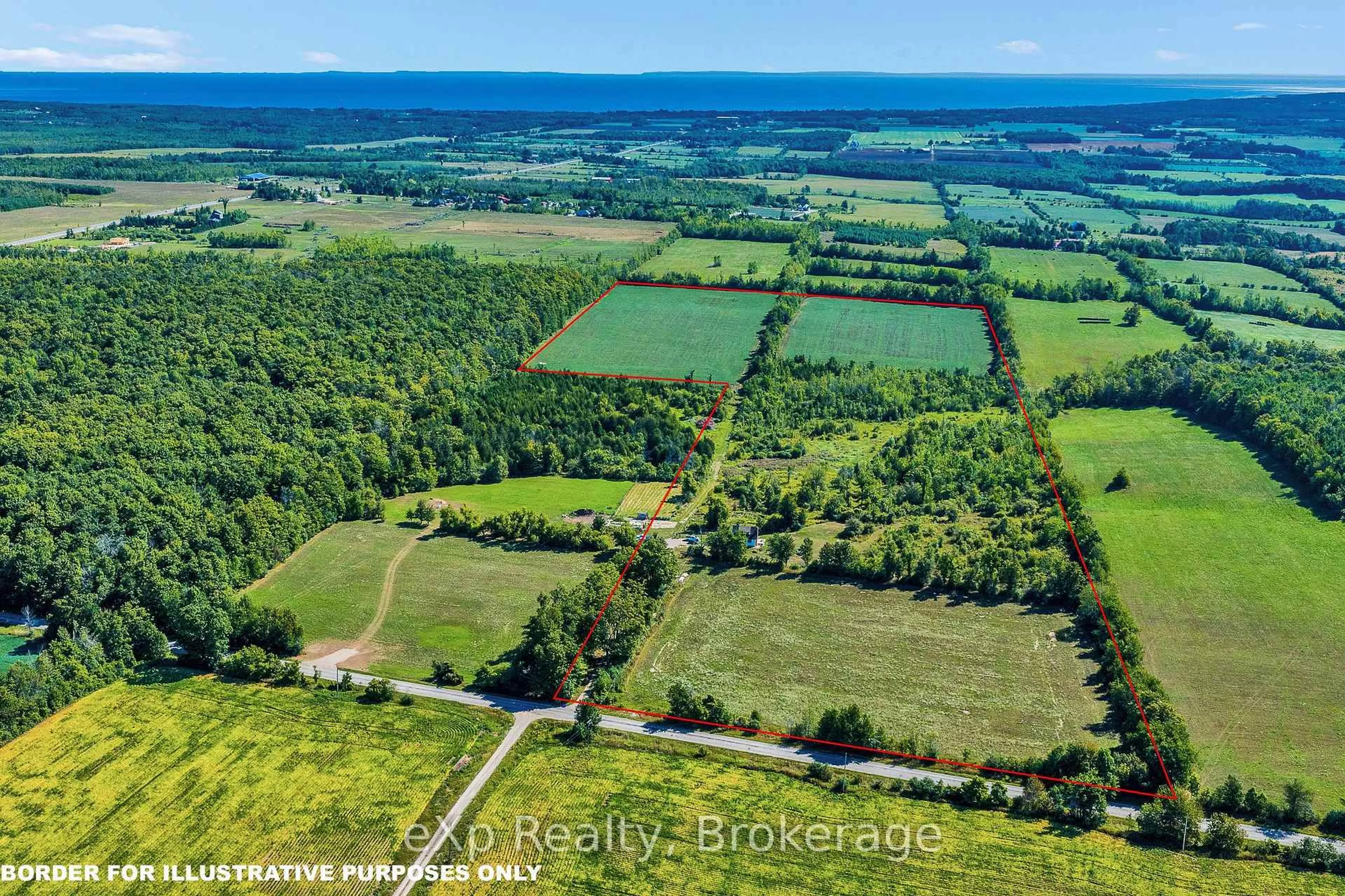 A pic from outside/outdoor area/front of a property/back of a property/a pic from drone, forest/trees view for 58111 12th Line, Meaford Ontario N4L 1W5