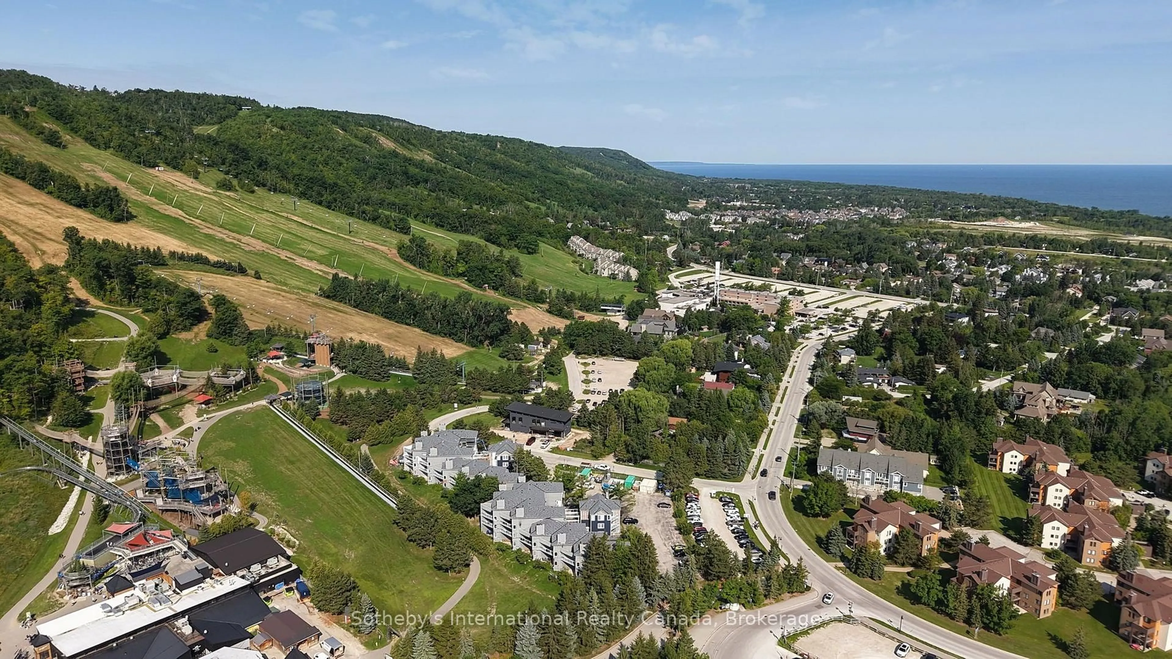 A pic from outside/outdoor area/front of a property/back of a property/a pic from drone, mountain view for 107 Ann Heggtveit Dr #212, Blue Mountains Ontario L9Y 0P7