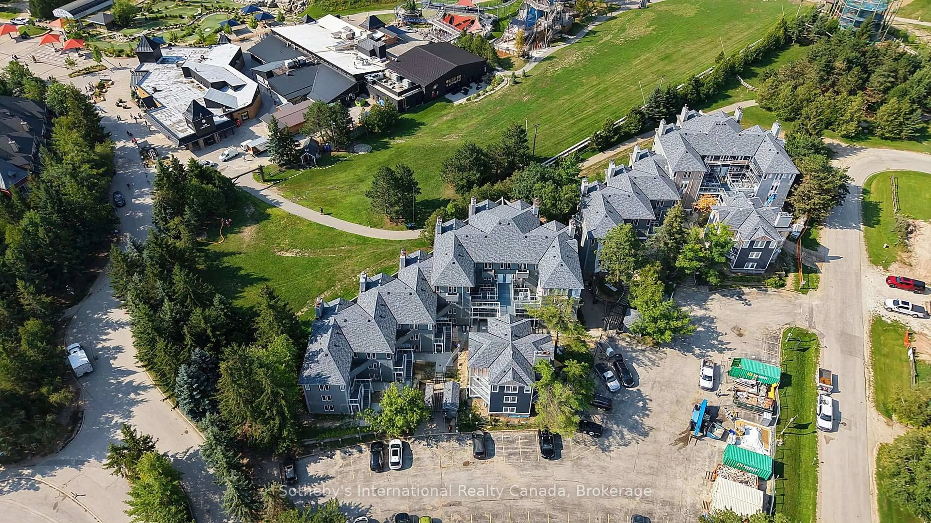 A pic from outside/outdoor area/front of a property/back of a property/a pic from drone, street for 107 Ann Heggtveit Dr #212, Blue Mountains Ontario L9Y 0P7