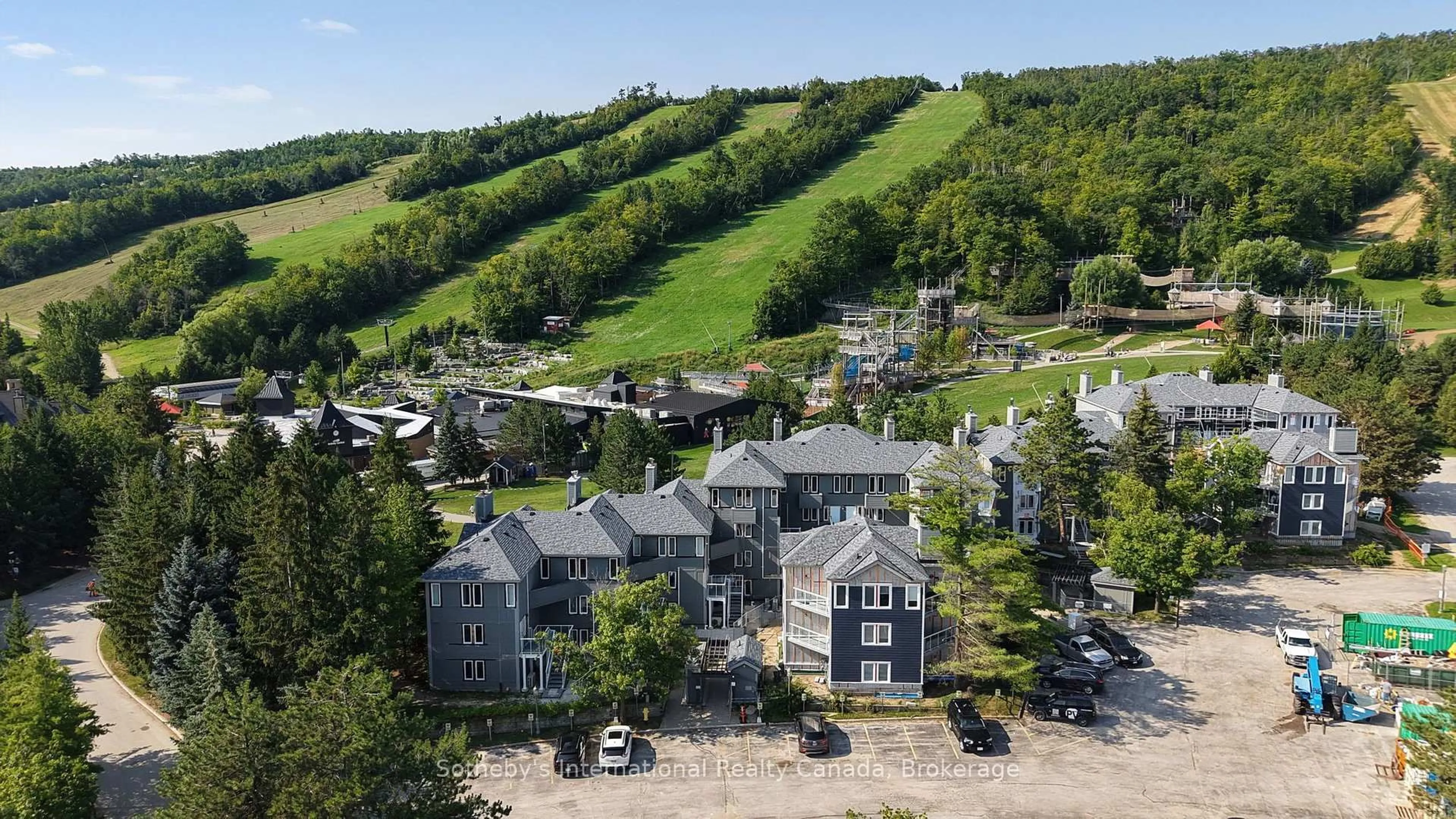A pic from outside/outdoor area/front of a property/back of a property/a pic from drone, mountain view for 107 Ann Heggtveit Dr #212, Blue Mountains Ontario L9Y 0P7