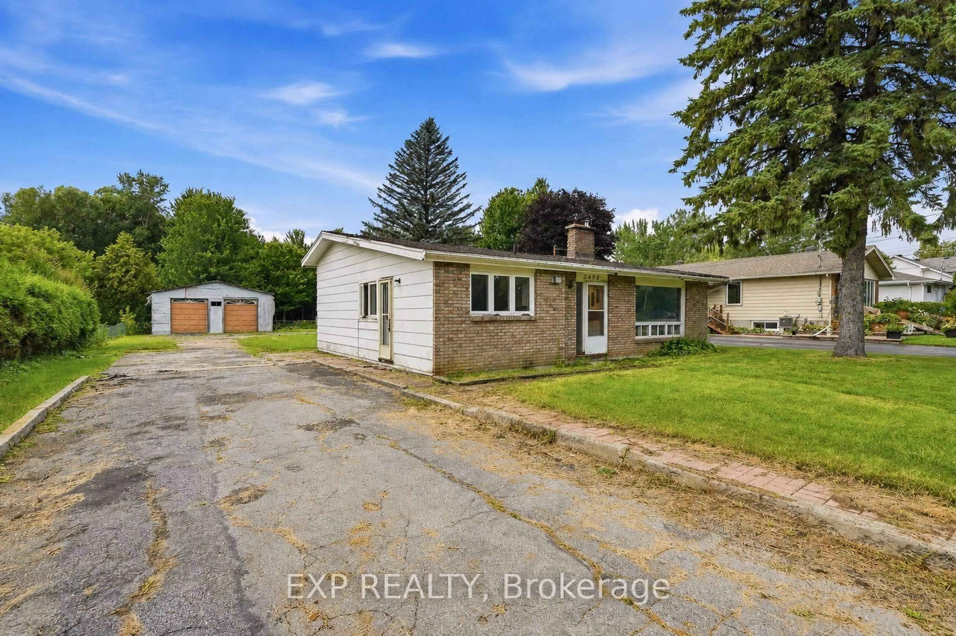 A pic from outside/outdoor area/front of a property/back of a property/a pic from drone, street for 2498 Mer Bleue Rd, Ottawa Ontario K4B 1H9
