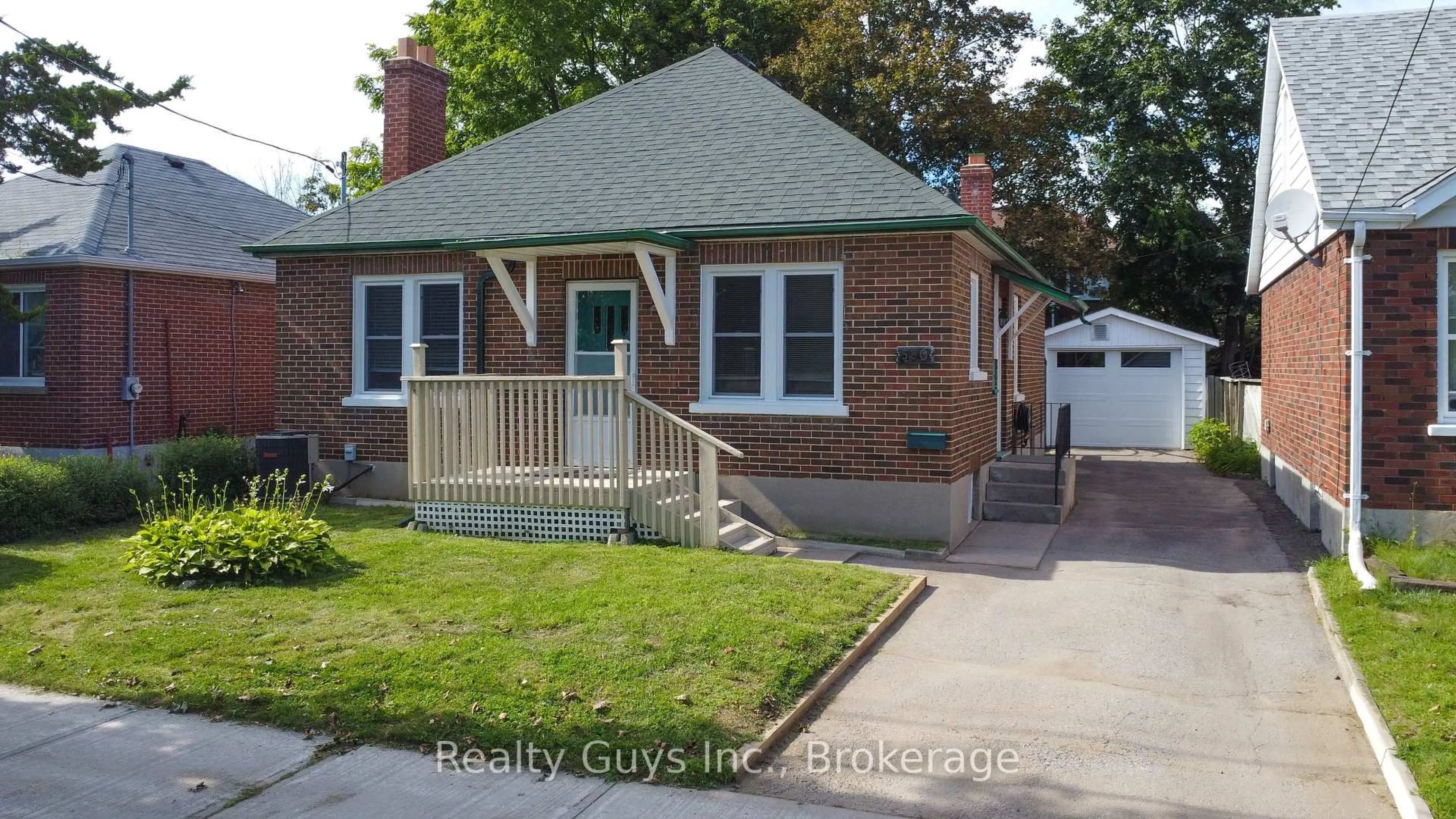 Home with brick exterior material, street for 590 Mccannan Ave, Peterborough Ontario K9J 4J6