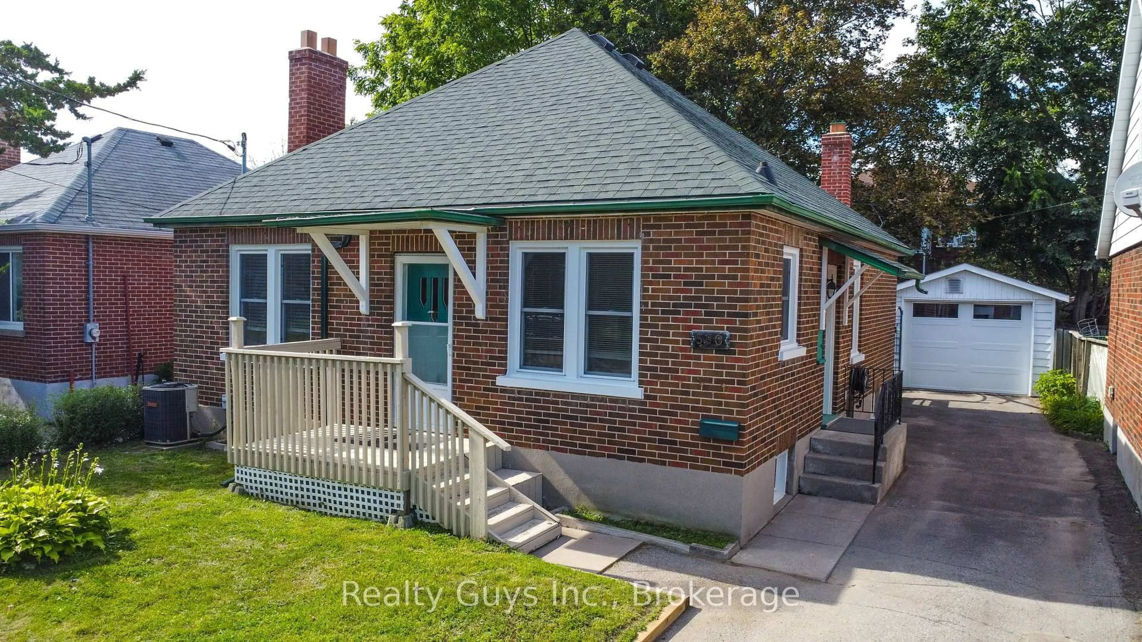 Home with brick exterior material, street for 590 Mccannan Ave, Peterborough Ontario K9J 4J6