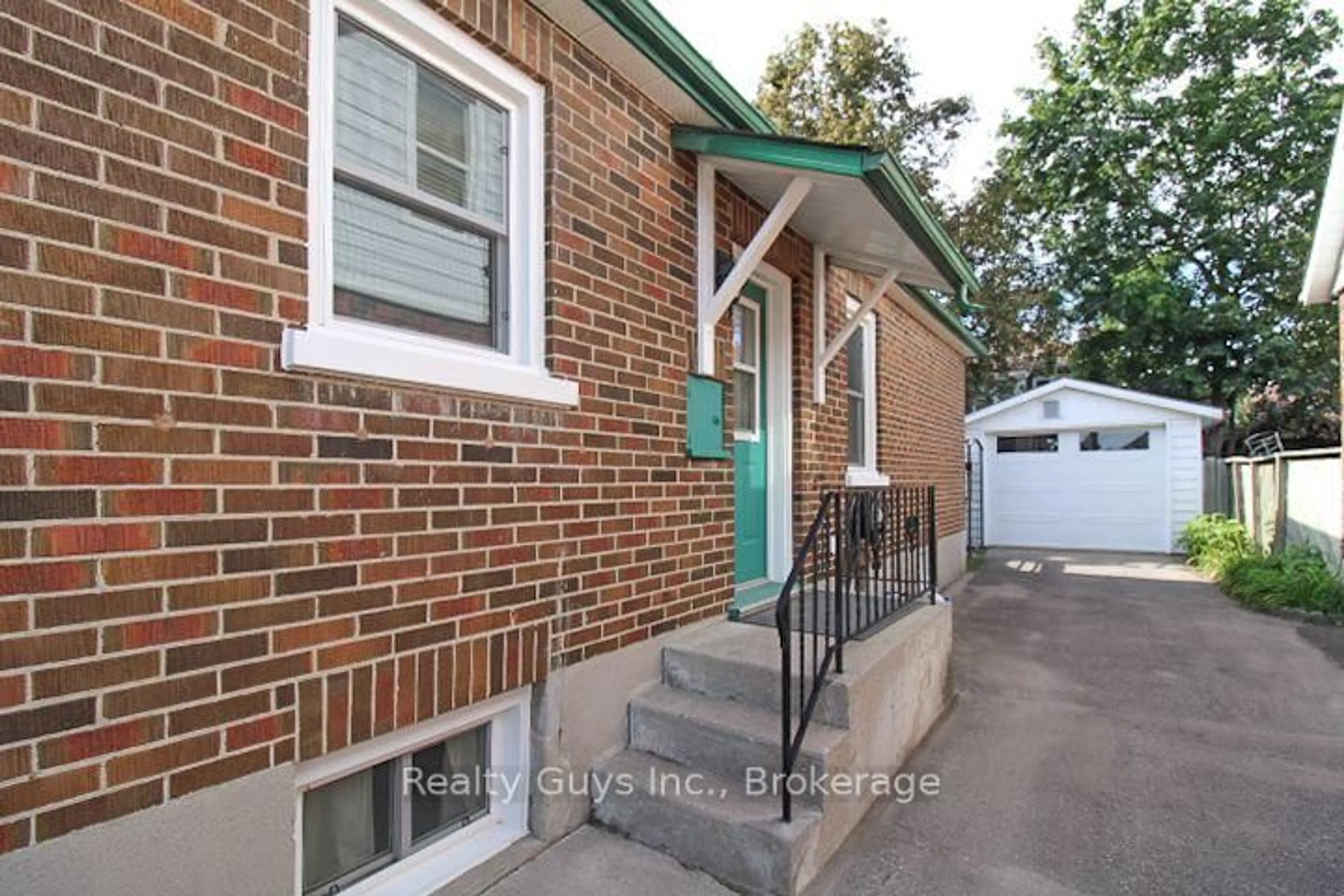 Home with brick exterior material, street for 590 Mccannan Ave, Peterborough Ontario K9J 4J6