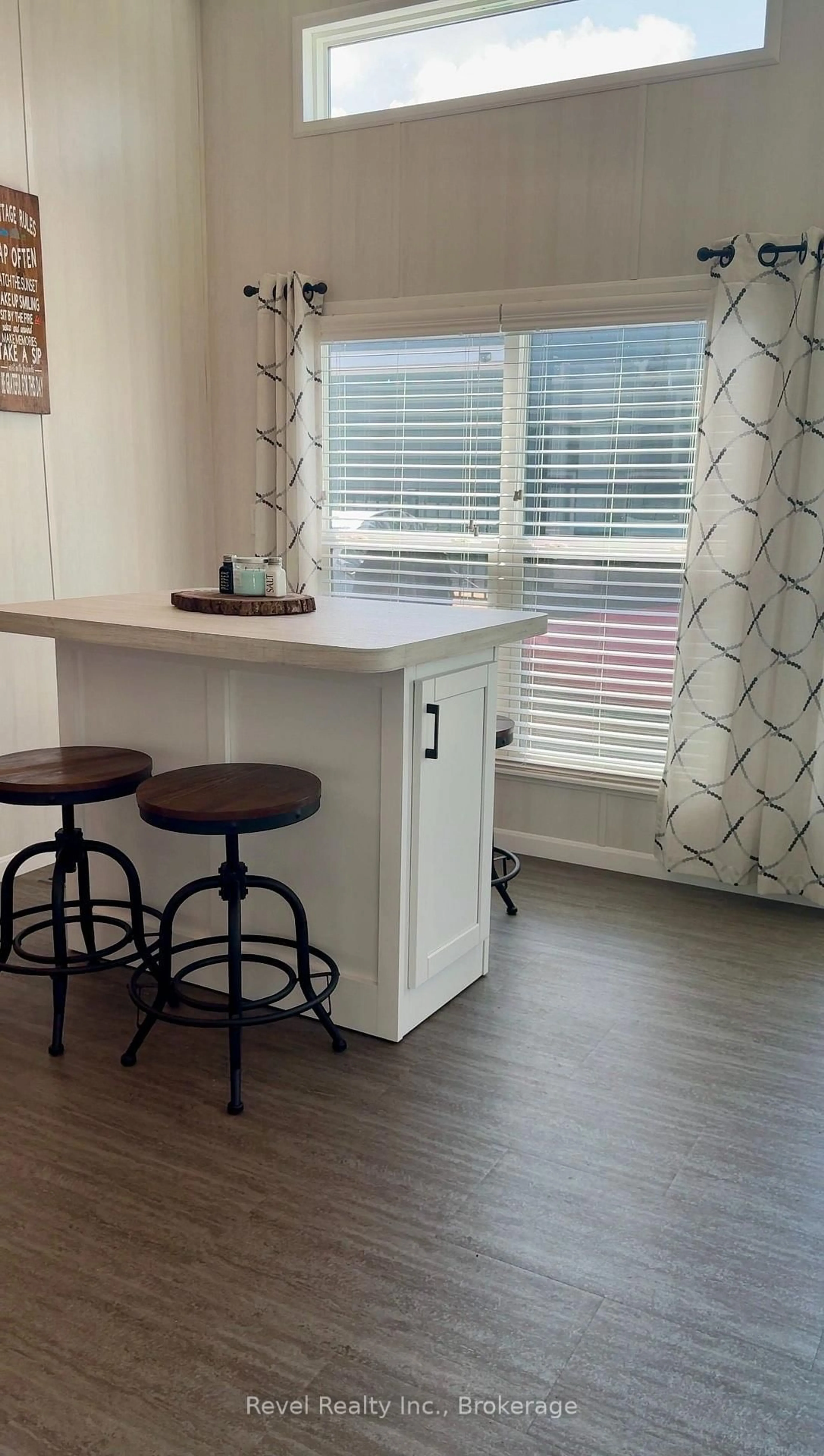 Open concept kitchen, wood/laminate floor for 657 Thunder Bridge Rd #CV082, Kawartha Lakes Ontario K9V 4R1