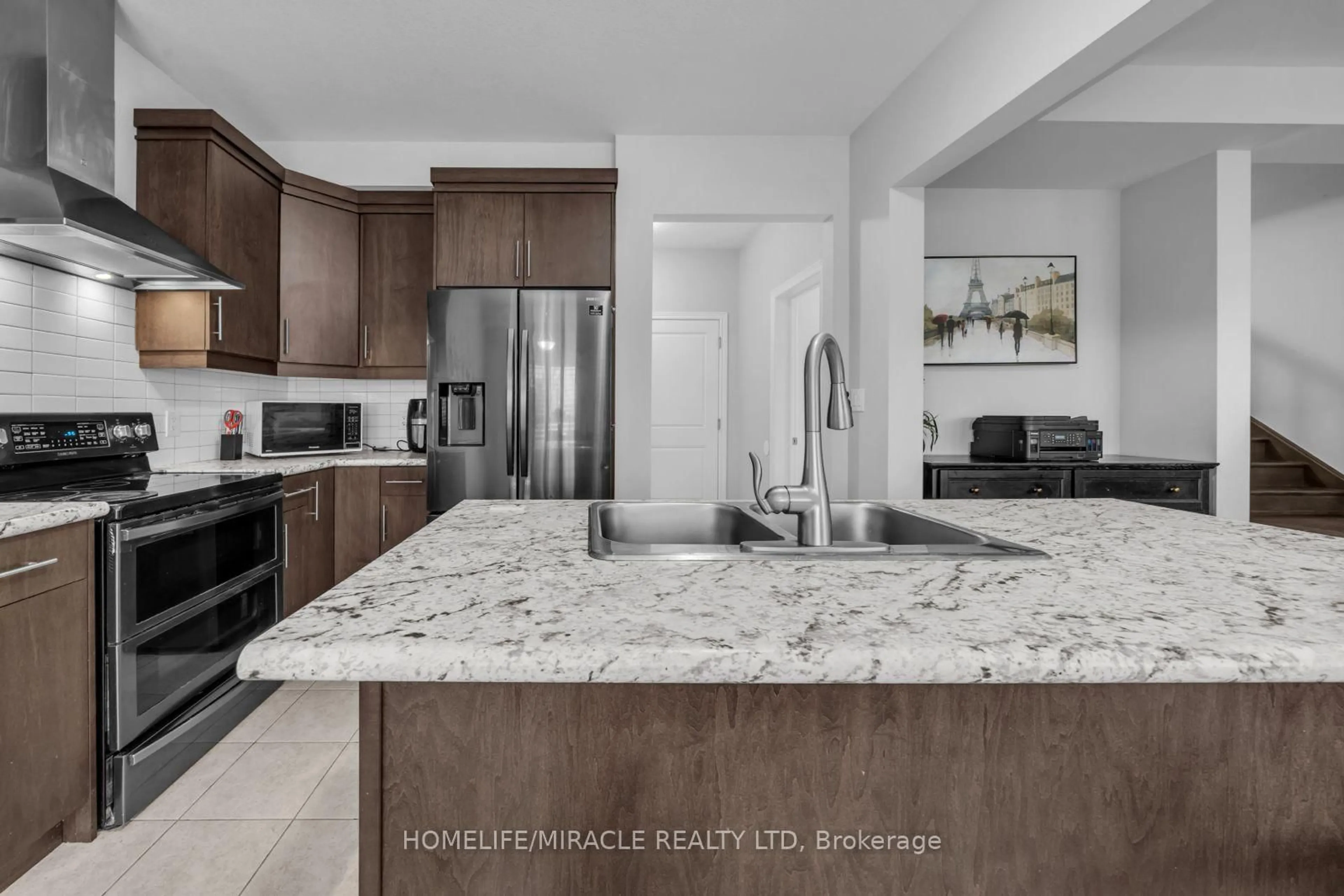 Open concept kitchen, ceramic/tile floor for 83 Monarch St, Welland Ontario L3C 0E6