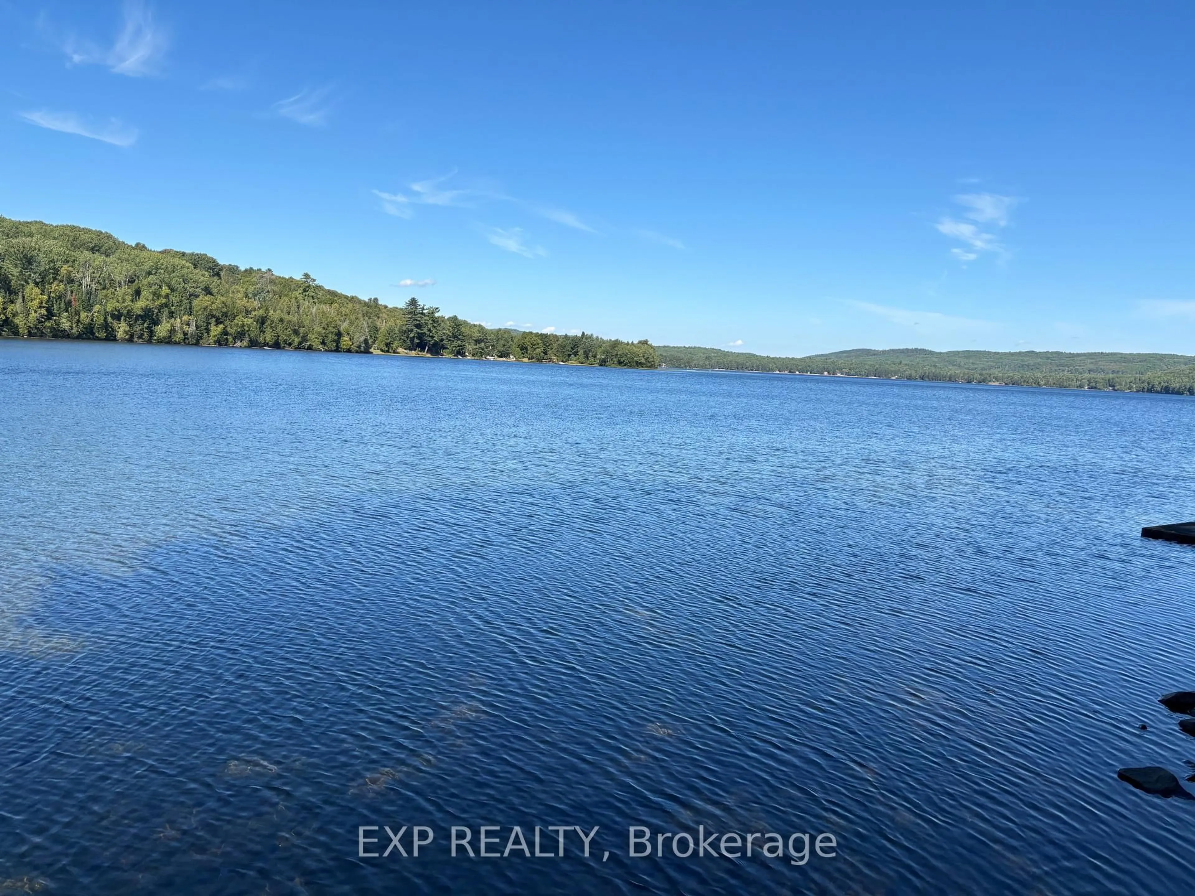 A pic from outside/outdoor area/front of a property/back of a property/a pic from drone, water/lake/river/ocean view for 134 Carson Heights Rd, Barry's Bay Ontario K0J 1B0