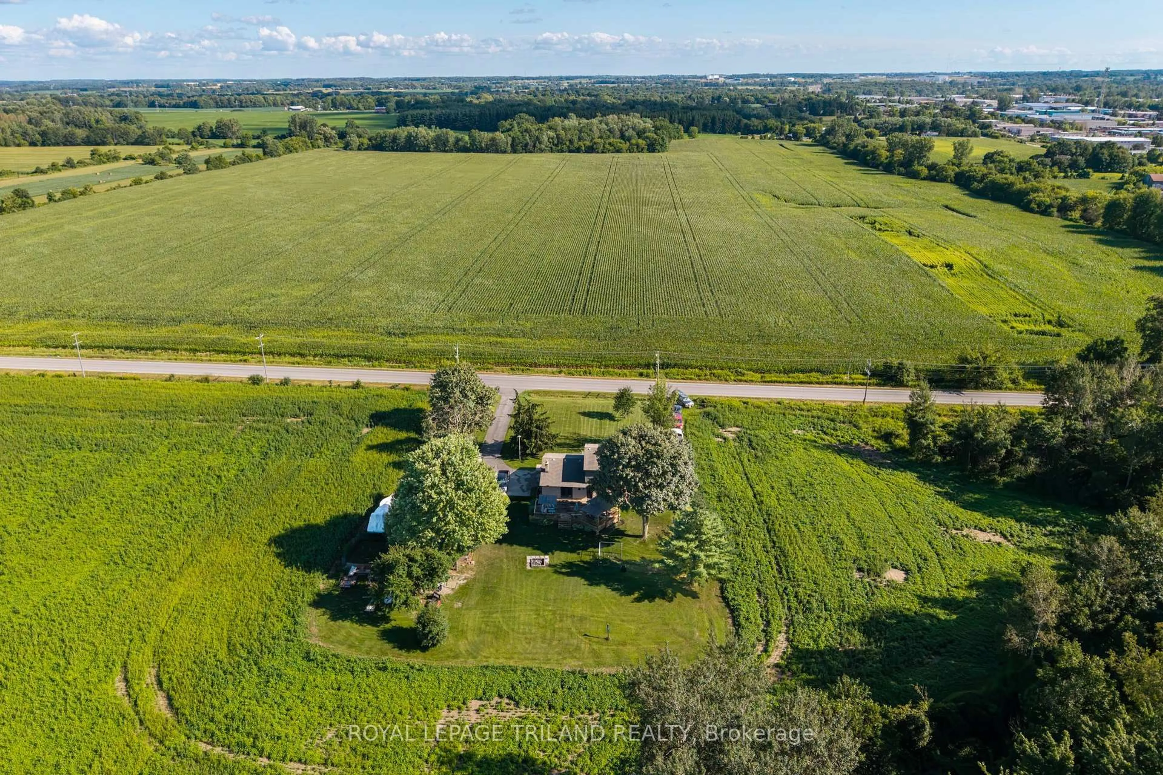 A pic from outside/outdoor area/front of a property/back of a property/a pic from drone, water/lake/river/ocean view for 2612 Trafalgar St, London East Ontario N6M 1G9