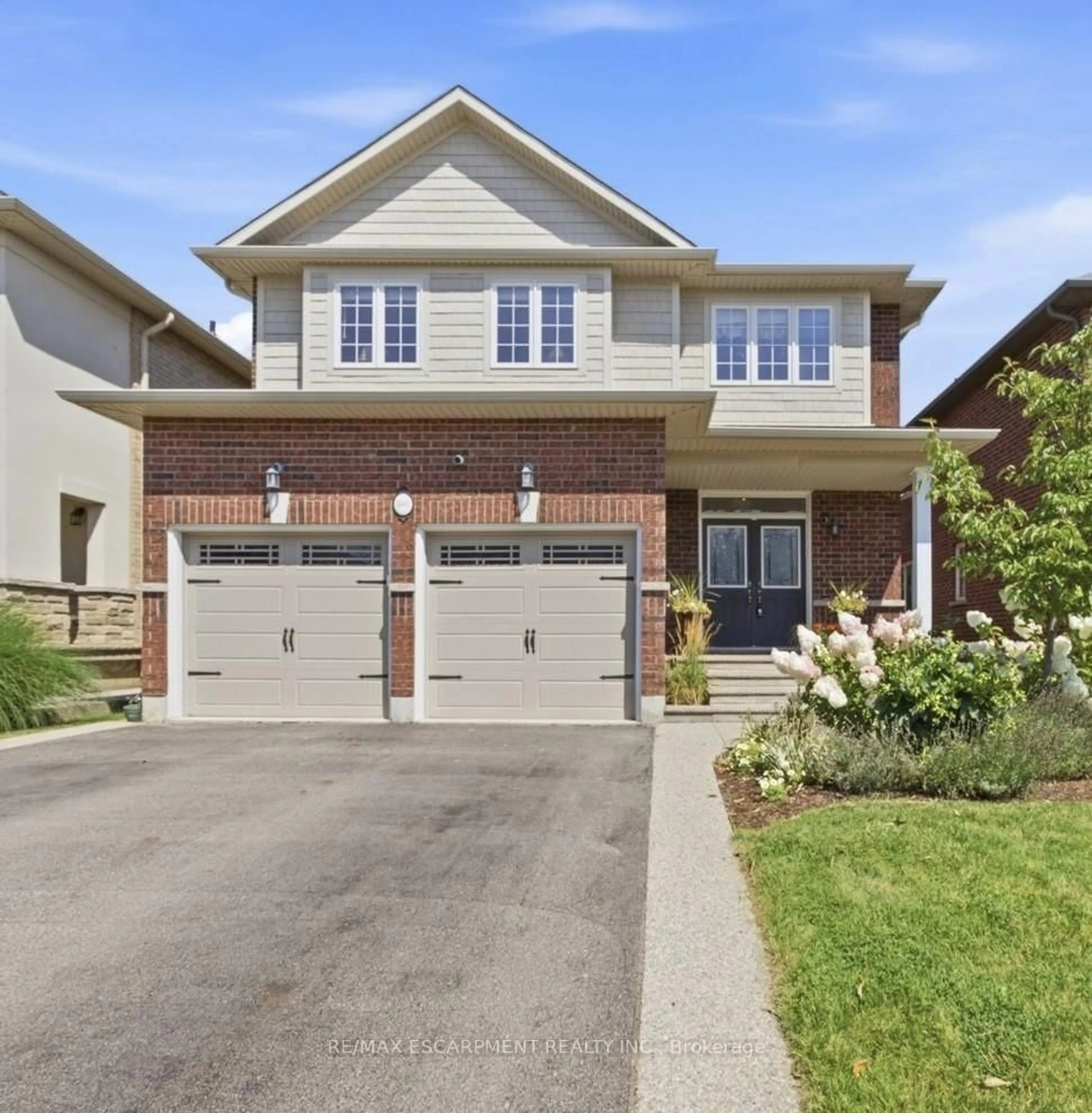 Home with brick exterior material, street for 401 Valridge Dr, Hamilton Ontario L9G 0B2