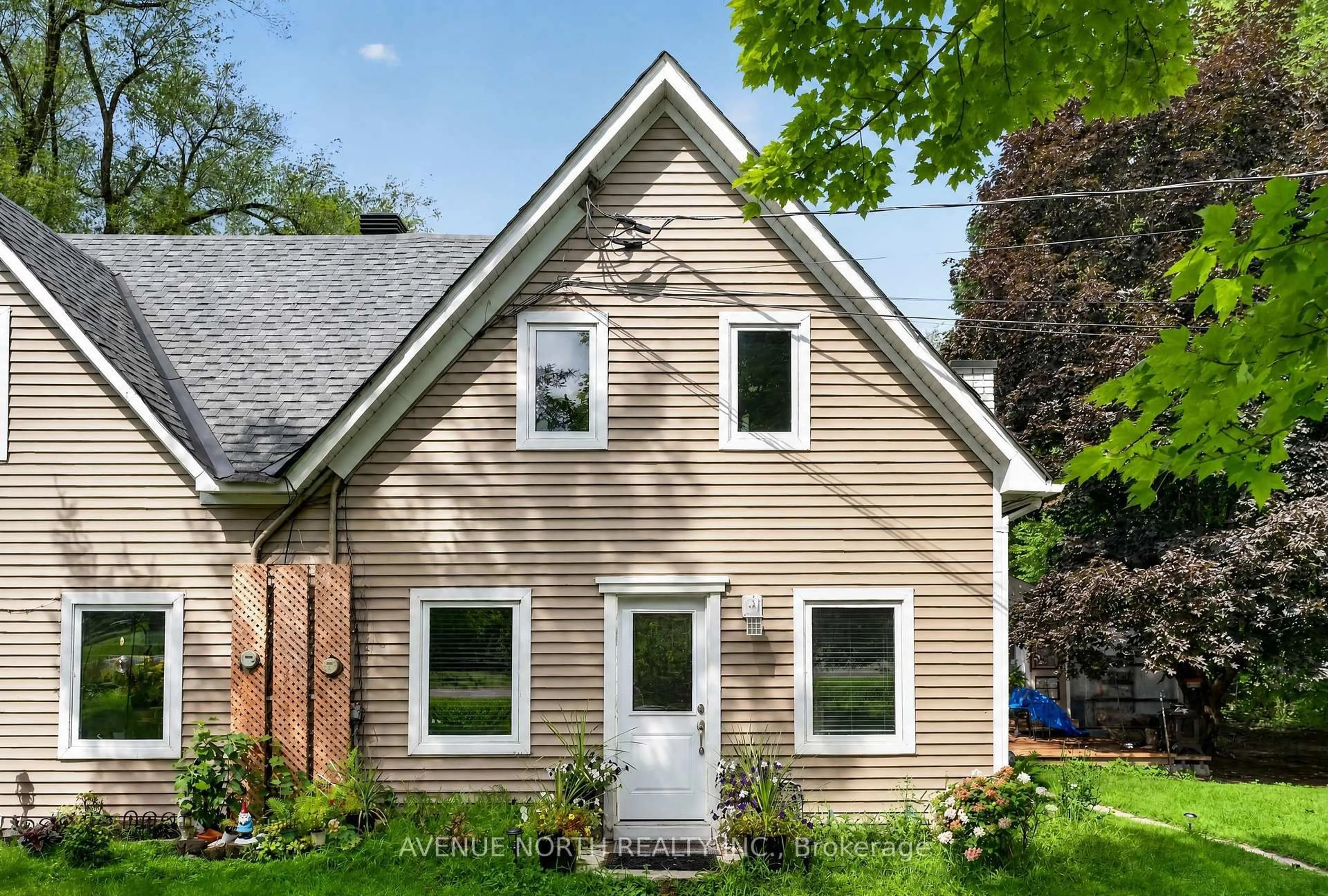 Home with vinyl exterior material, street for 2943 Old Montreal Rd, Ottawa Ontario K4C 1G2