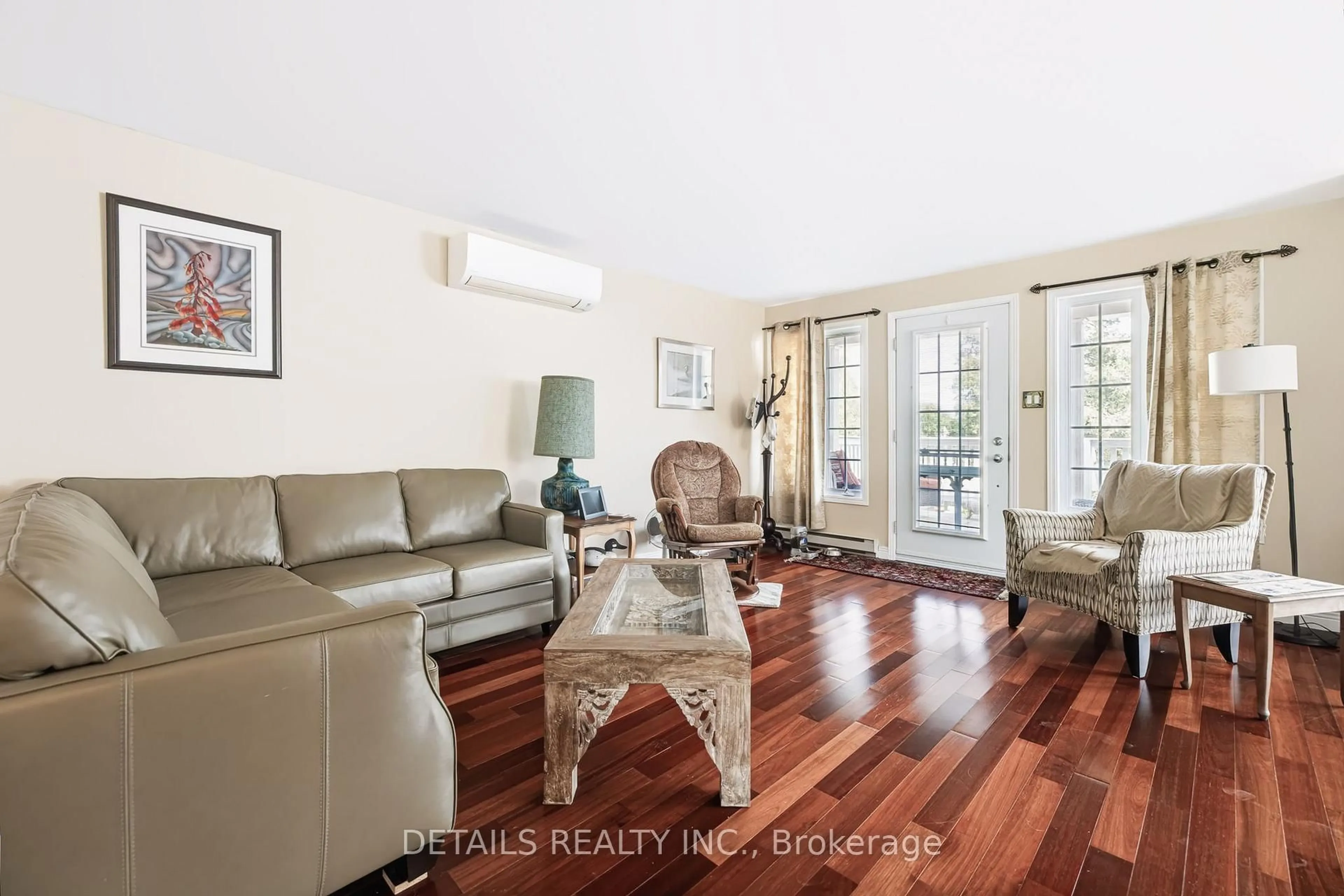 Living room with furniture, wood/laminate floor for 212 Wellington St, Merrickville-Wolford Ontario K0G 1N0