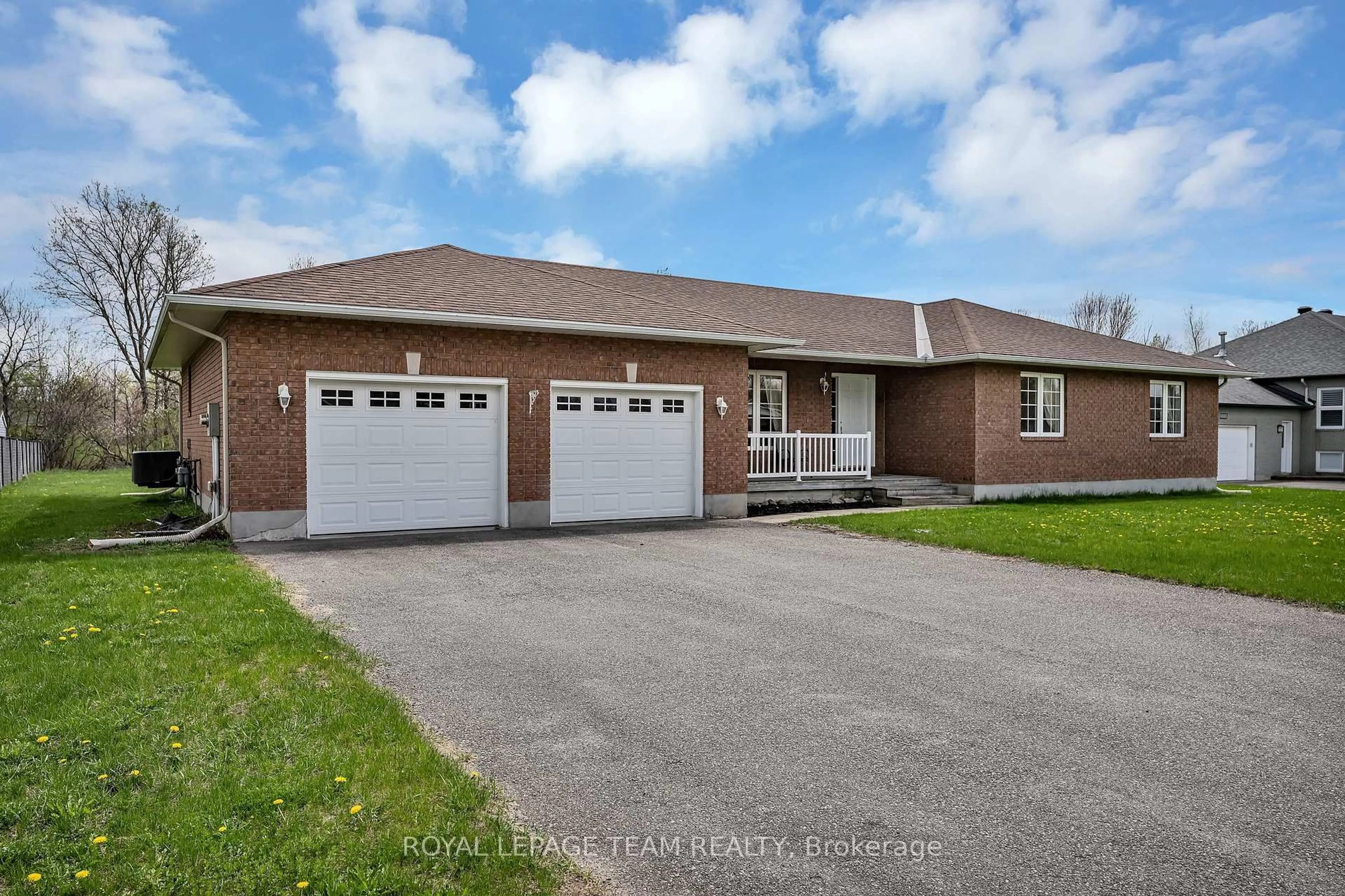 Home with brick exterior material, street for 6668 Tommary Dr, Ottawa Ontario K4P 1G8