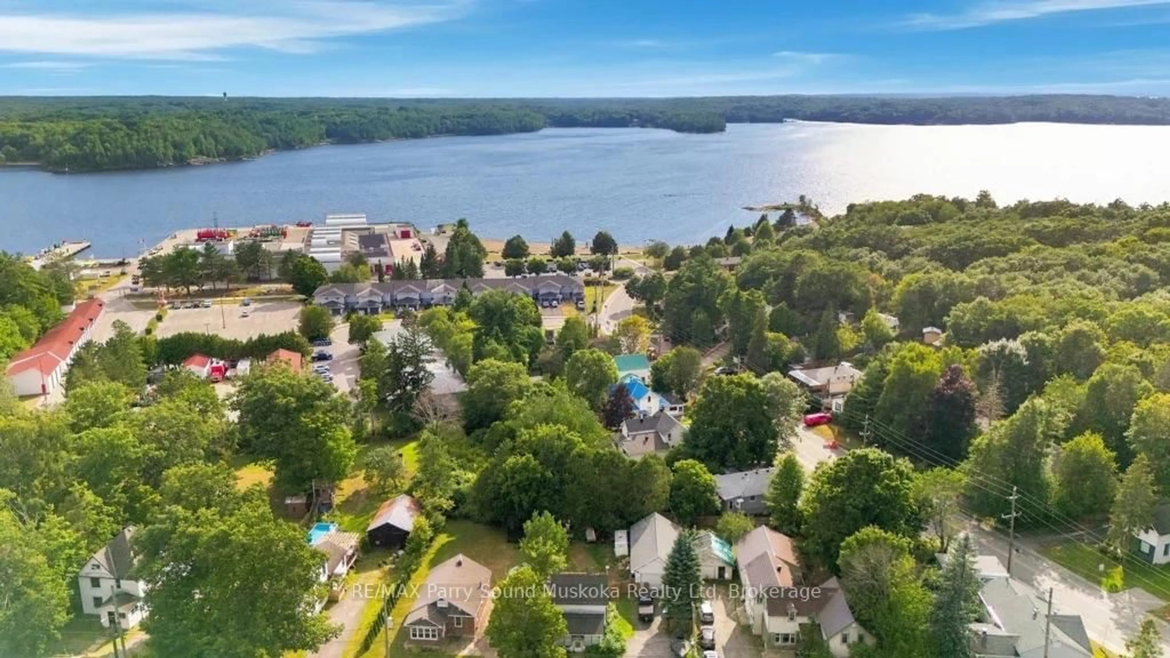 A pic from outside/outdoor area/front of a property/back of a property/a pic from drone, water/lake/river/ocean view for 40 WAUBEEK St, Parry Sound Ontario P2A 1C2