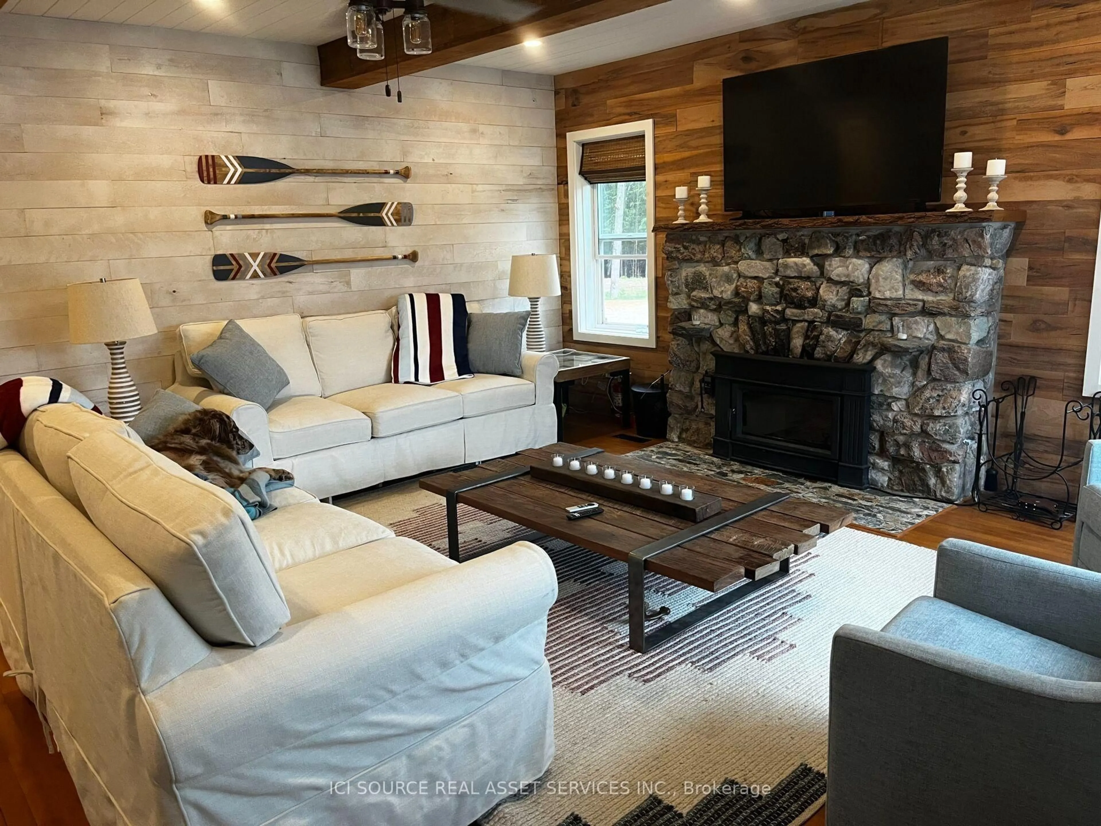 Living room with furniture, wood/laminate floor for 332 Ohio Rd, Madawaska Valley Ontario K0L 1H0