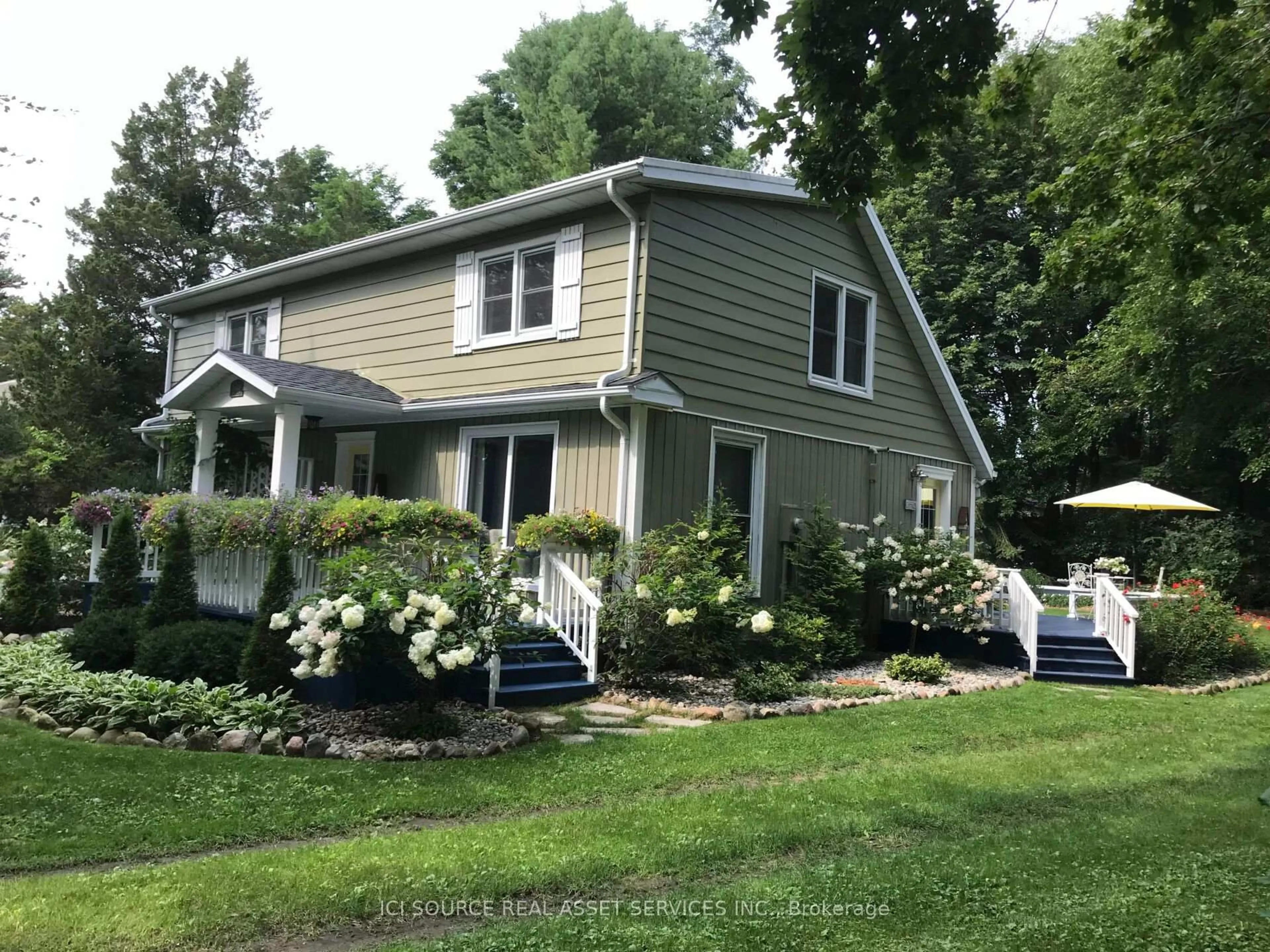 Home with vinyl exterior material, street for 8768 Park St, Lambton Shores Ontario N0N 1J7