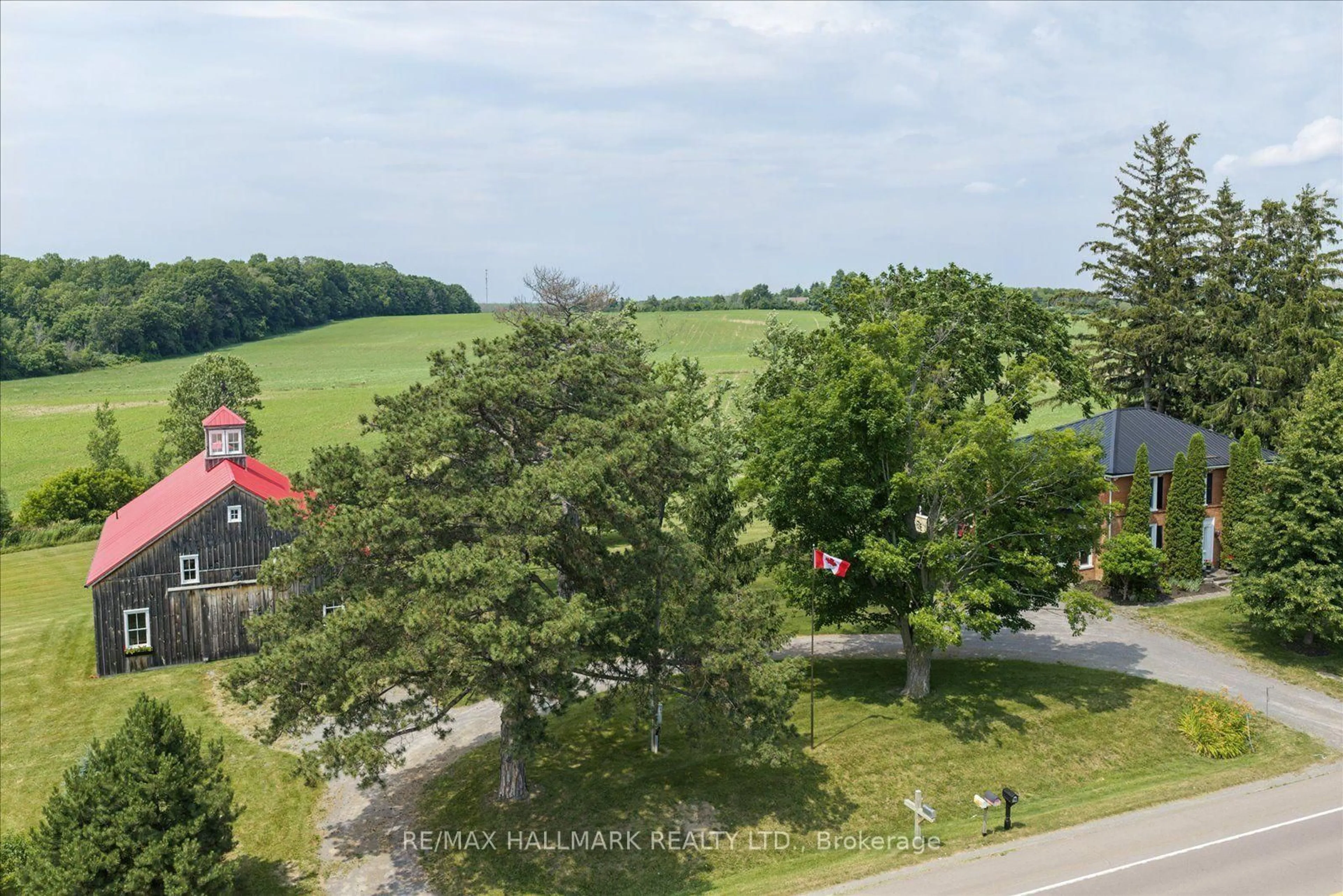 A pic from outside/outdoor area/front of a property/back of a property/a pic from drone, water/lake/river/ocean view for 13840 Loyalist Pkwy, Prince Edward County Ontario K0K 2T0