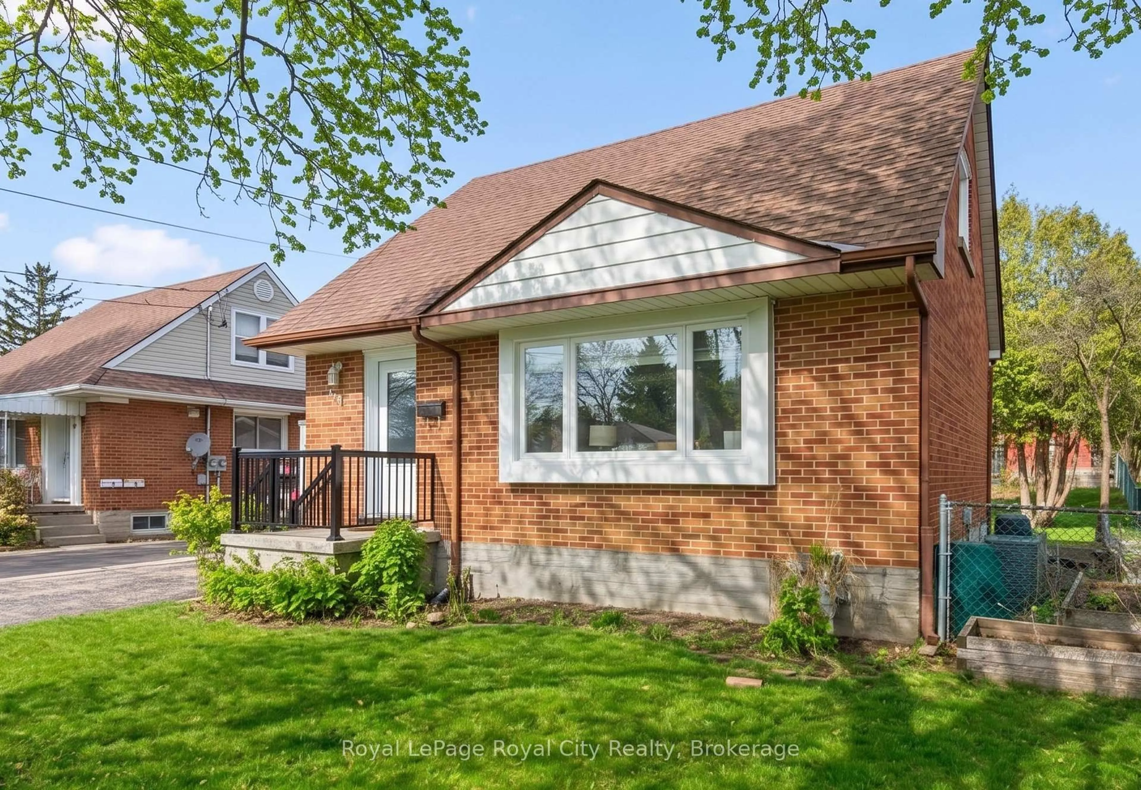 Home with brick exterior material, street for 103 William St, Guelph Ontario N1E 5G2