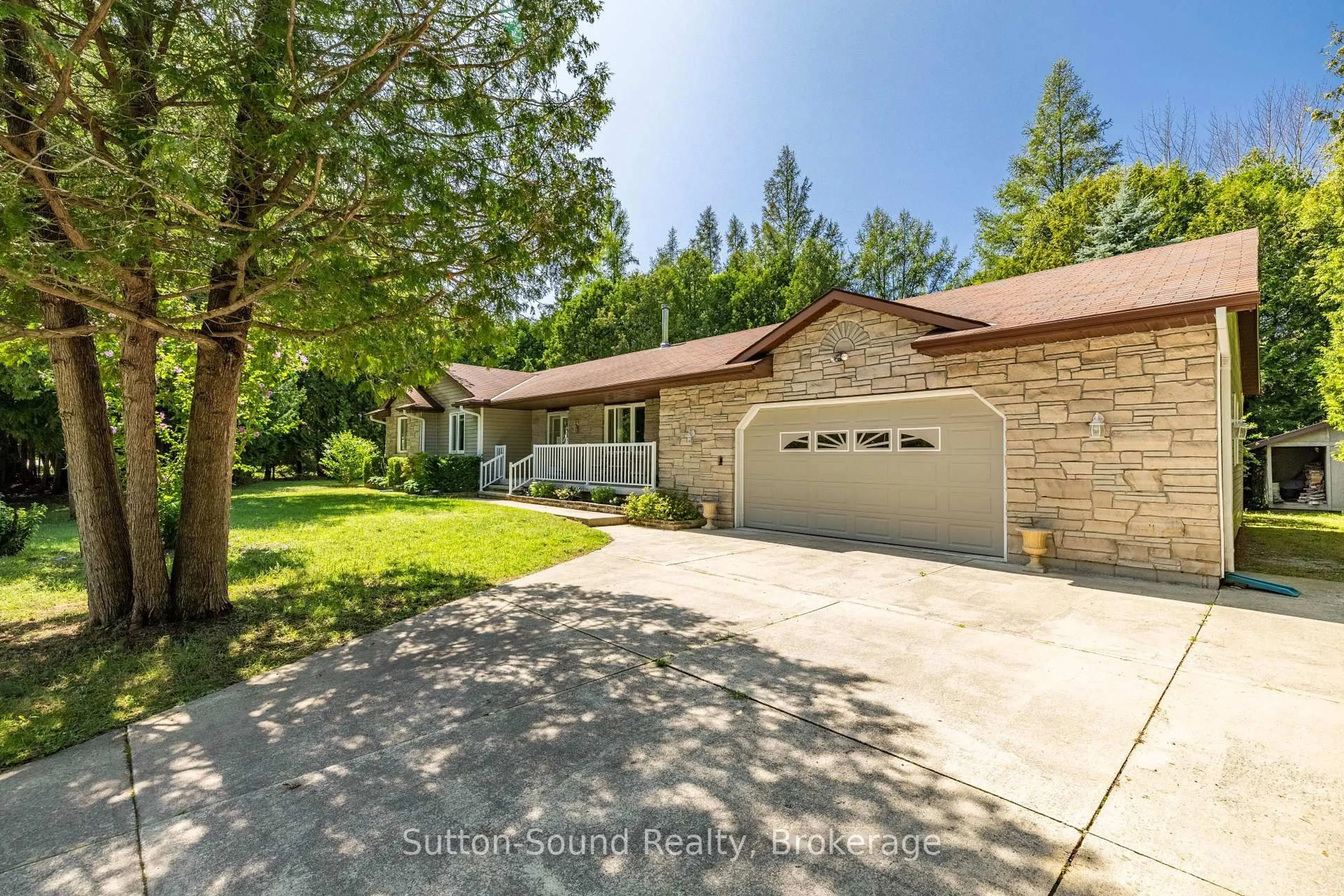 A pic from outside/outdoor area/front of a property/back of a property/a pic from drone, street for 14 Shamrock Blvd, South Bruce Peninsula Ontario N0H 2N0
