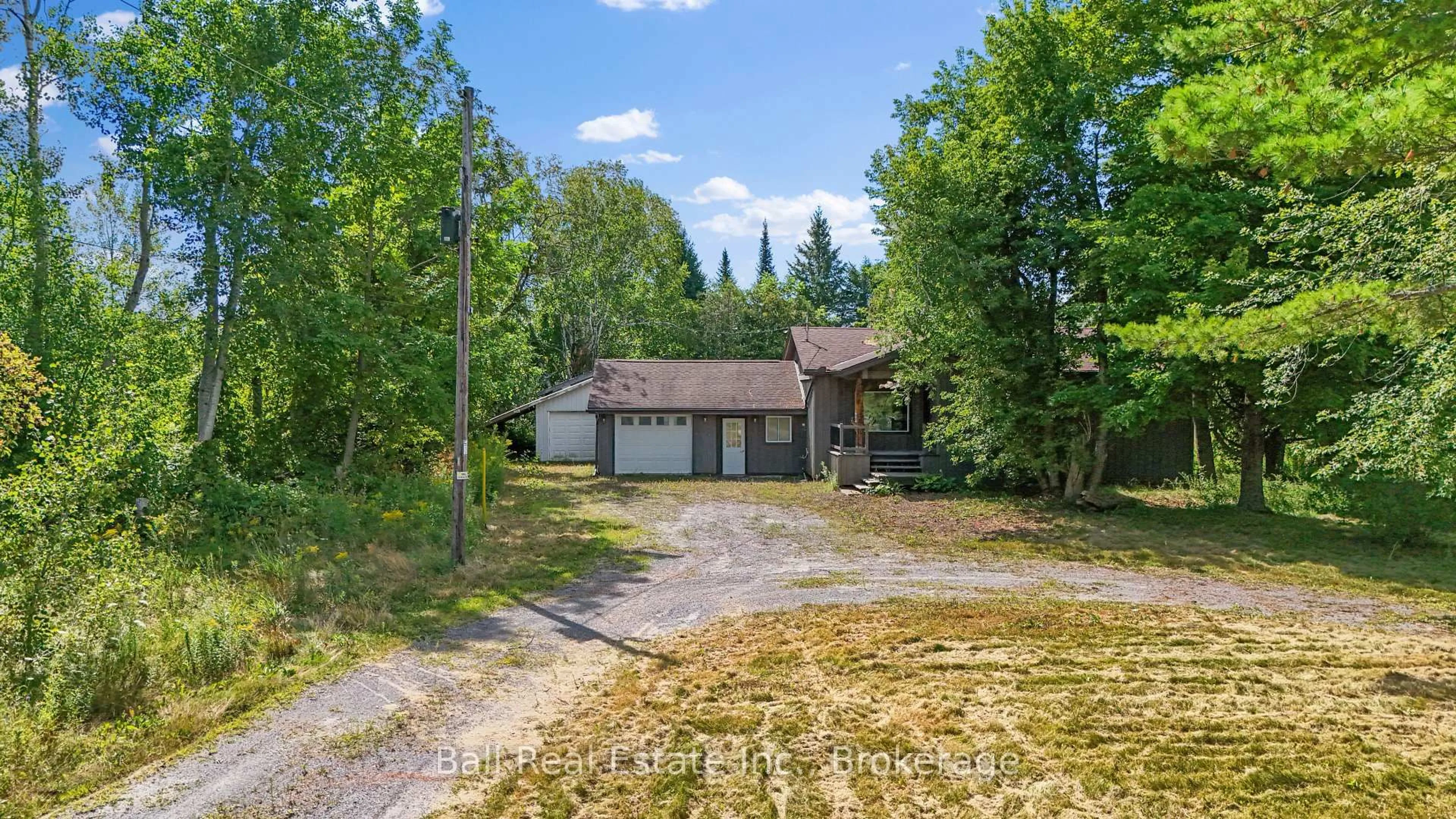 A pic from outside/outdoor area/front of a property/back of a property/a pic from drone, street for 2101 County Rd 6 Rd, Douro-Dummer Ontario K0L 2H0