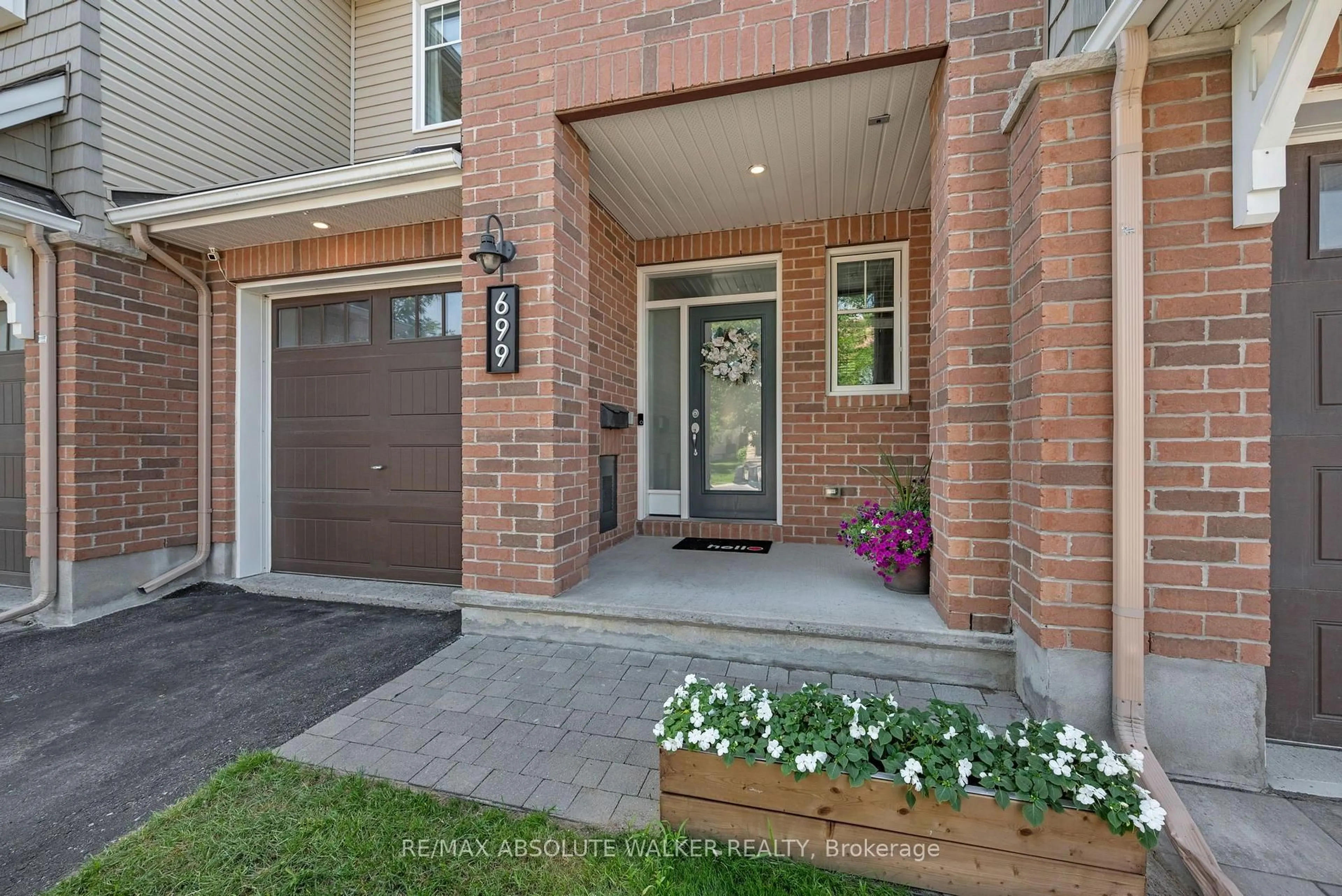 Home with brick exterior material, street for 699 Cartographe St, Ottawa Ontario K4A 0Y8