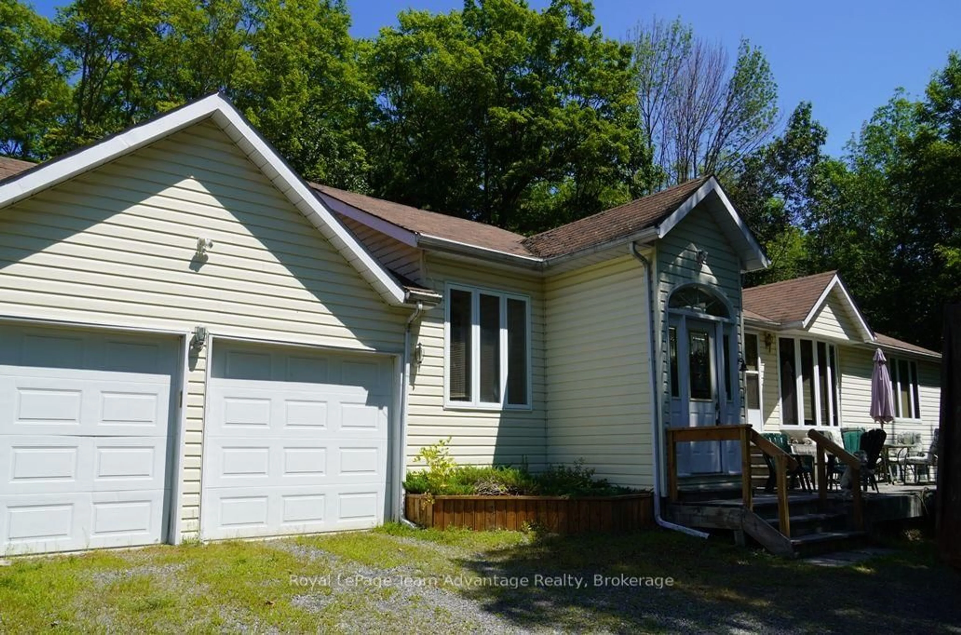 Home with vinyl exterior material, street for 101 Carling Bay Rd, Carling Ontario P0G 1G0