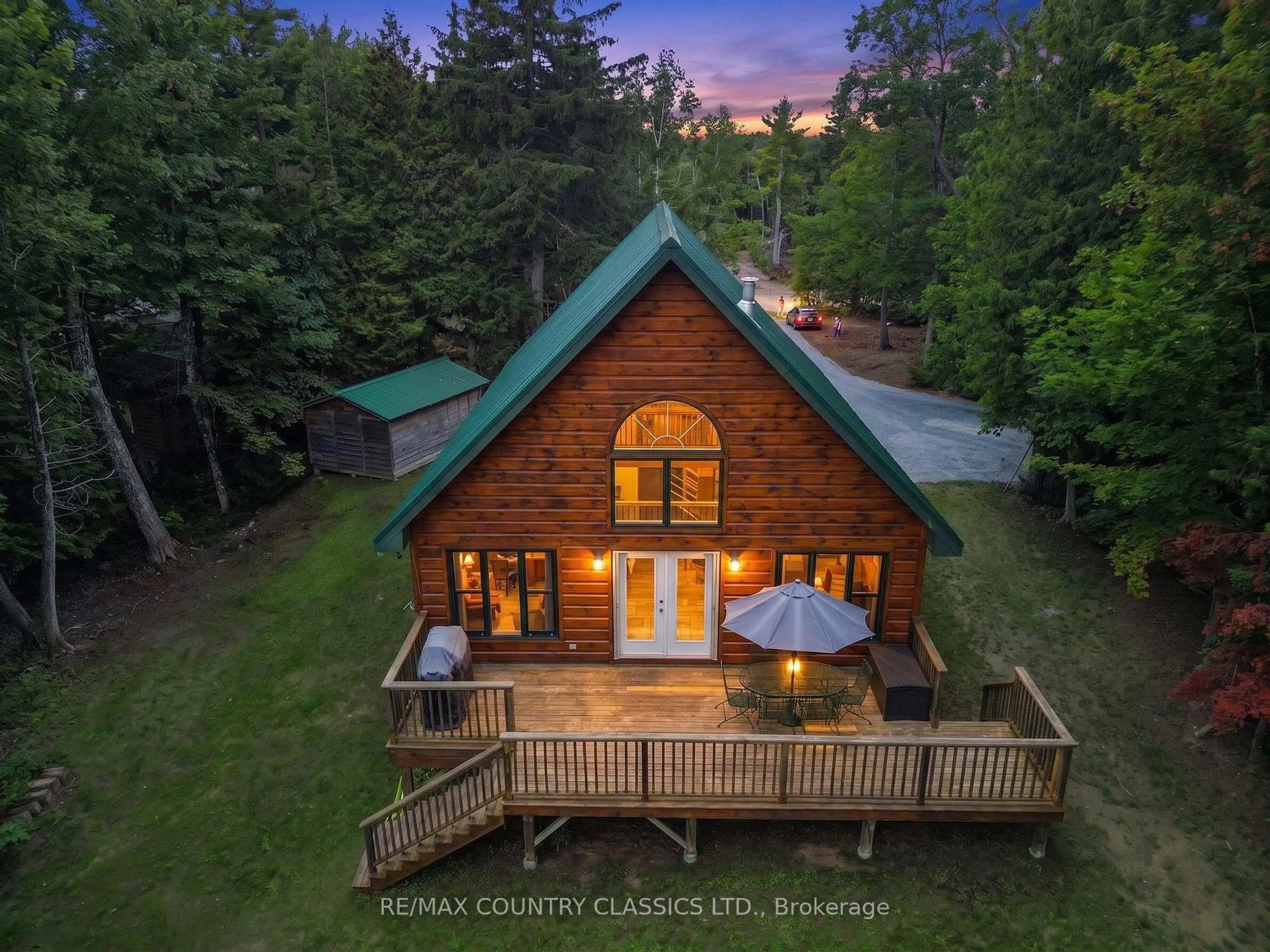 A pic from outside/outdoor area/front of a property/back of a property/a pic from drone, unknown for 203 Doc Evans Rd, North Kawartha Ontario K0L 1A0