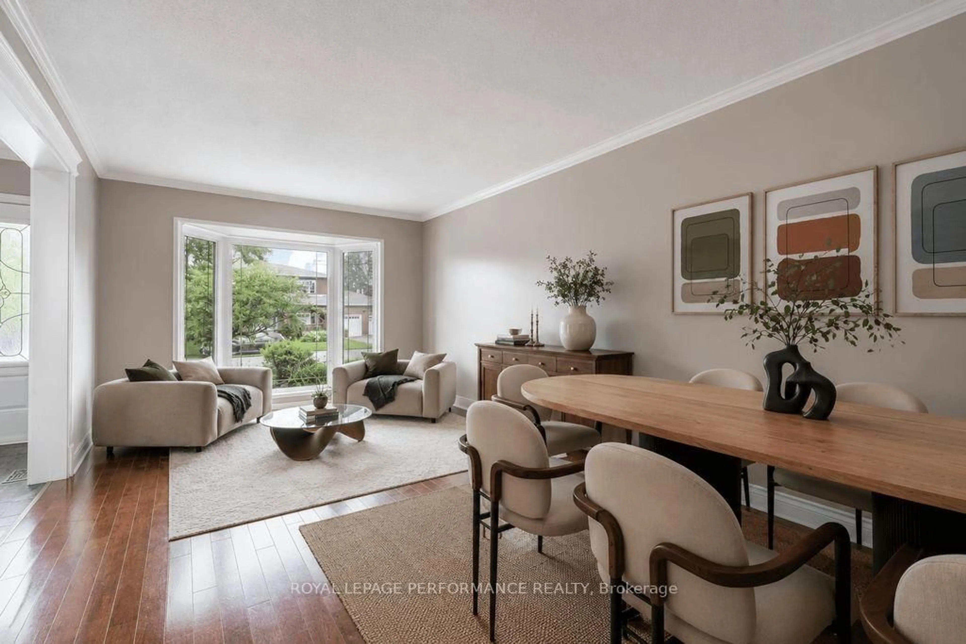 Living room with furniture, wood/laminate floor for 57 Paula Cres, Ottawa Ontario K2H 8Y8