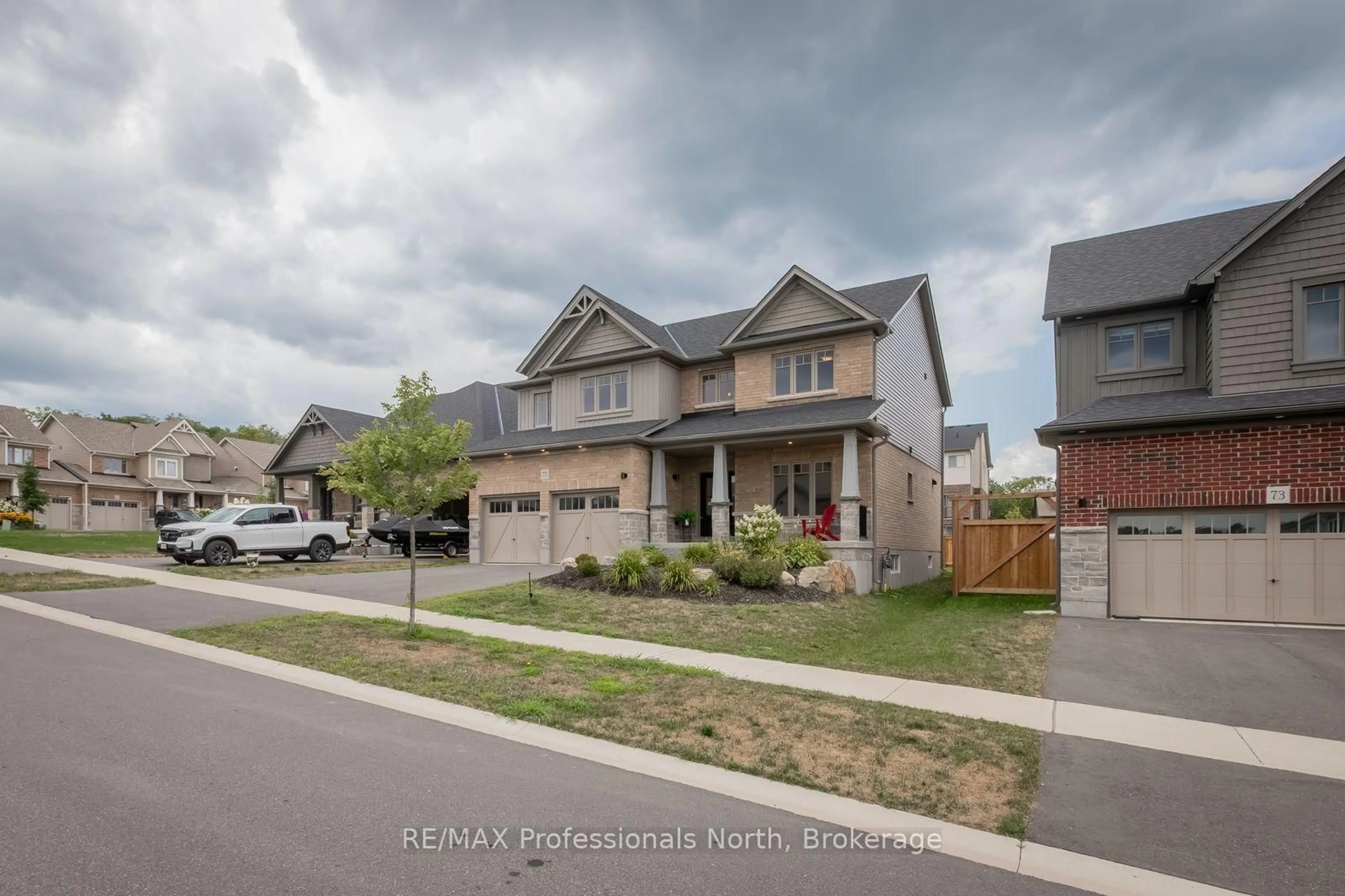 Home with brick exterior material, street for 75 Eaglecrest Ave, Huntsville Ontario P1H 0G5