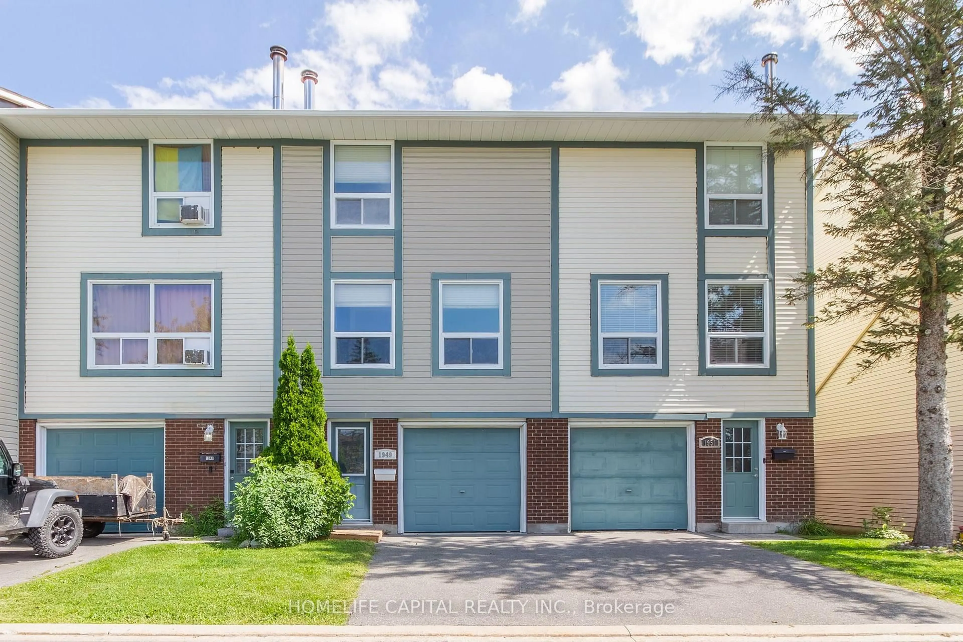 Home with vinyl exterior material, street for 1949 Greenway Park Lane, Ottawa Ontario K1B 5A9