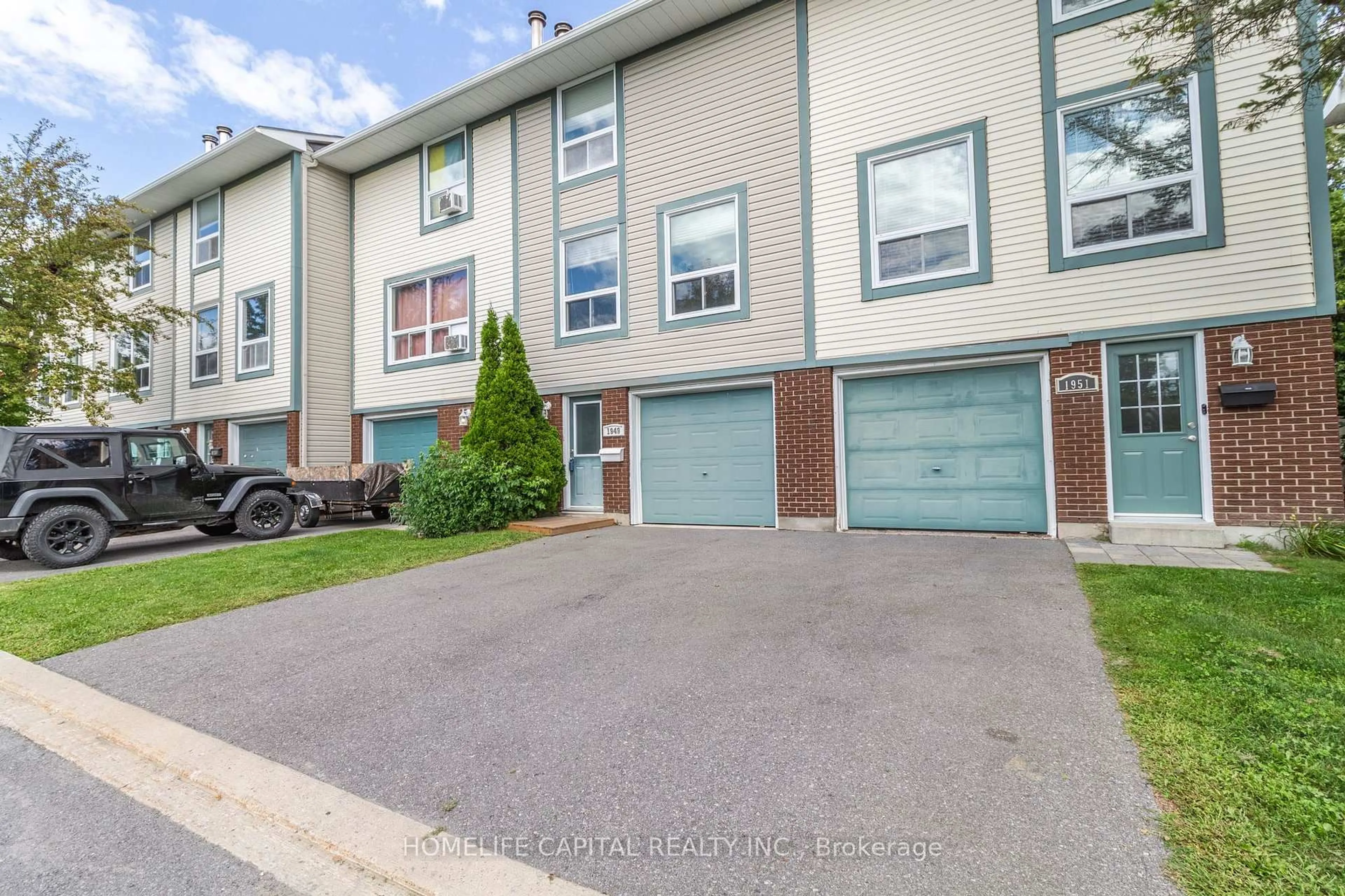 A pic from outside/outdoor area/front of a property/back of a property/a pic from drone, street for 1949 Greenway Park Lane, Ottawa Ontario K1B 5A9