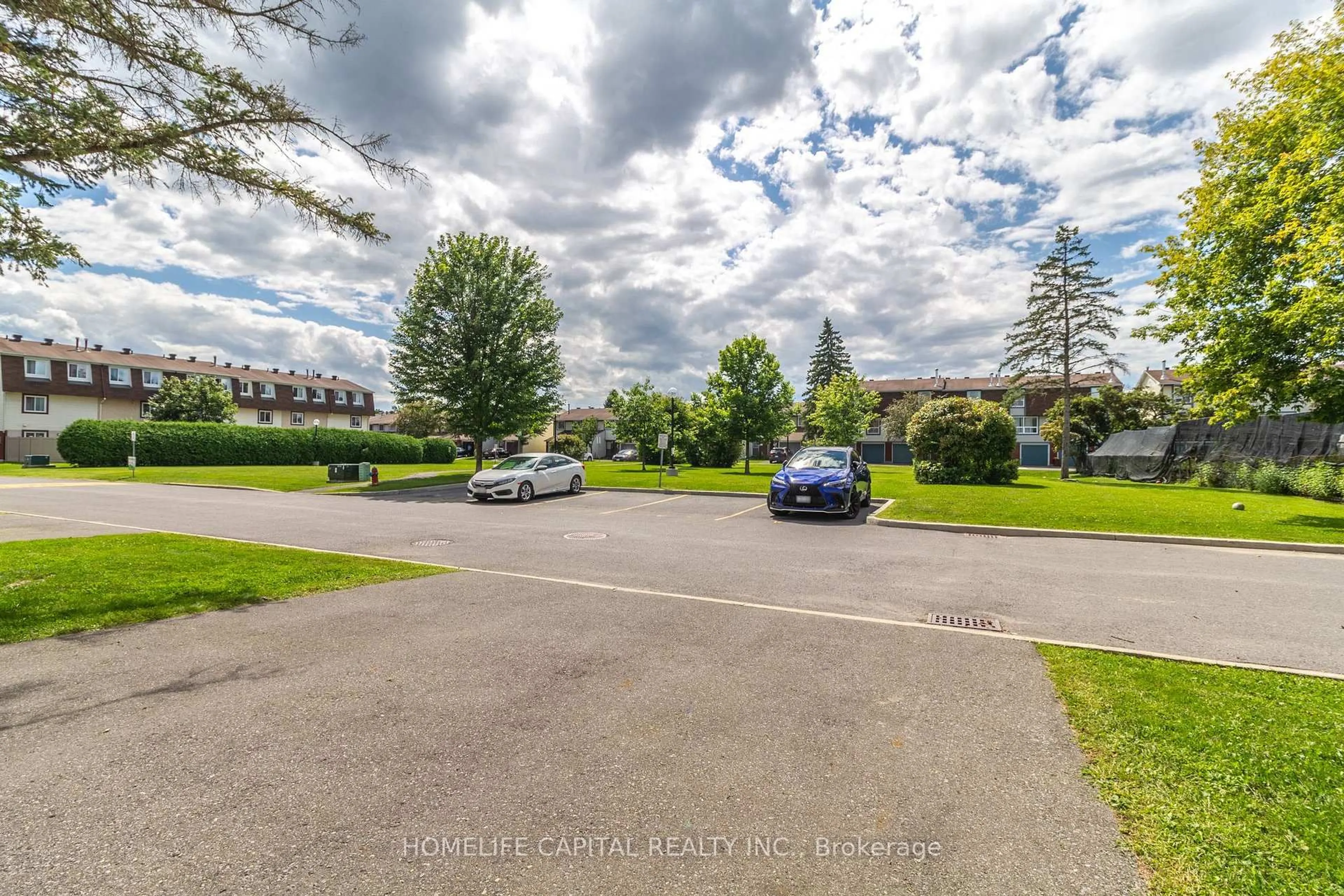 A pic from outside/outdoor area/front of a property/back of a property/a pic from drone, street for 1949 Greenway Park Lane, Ottawa Ontario K1B 5A9