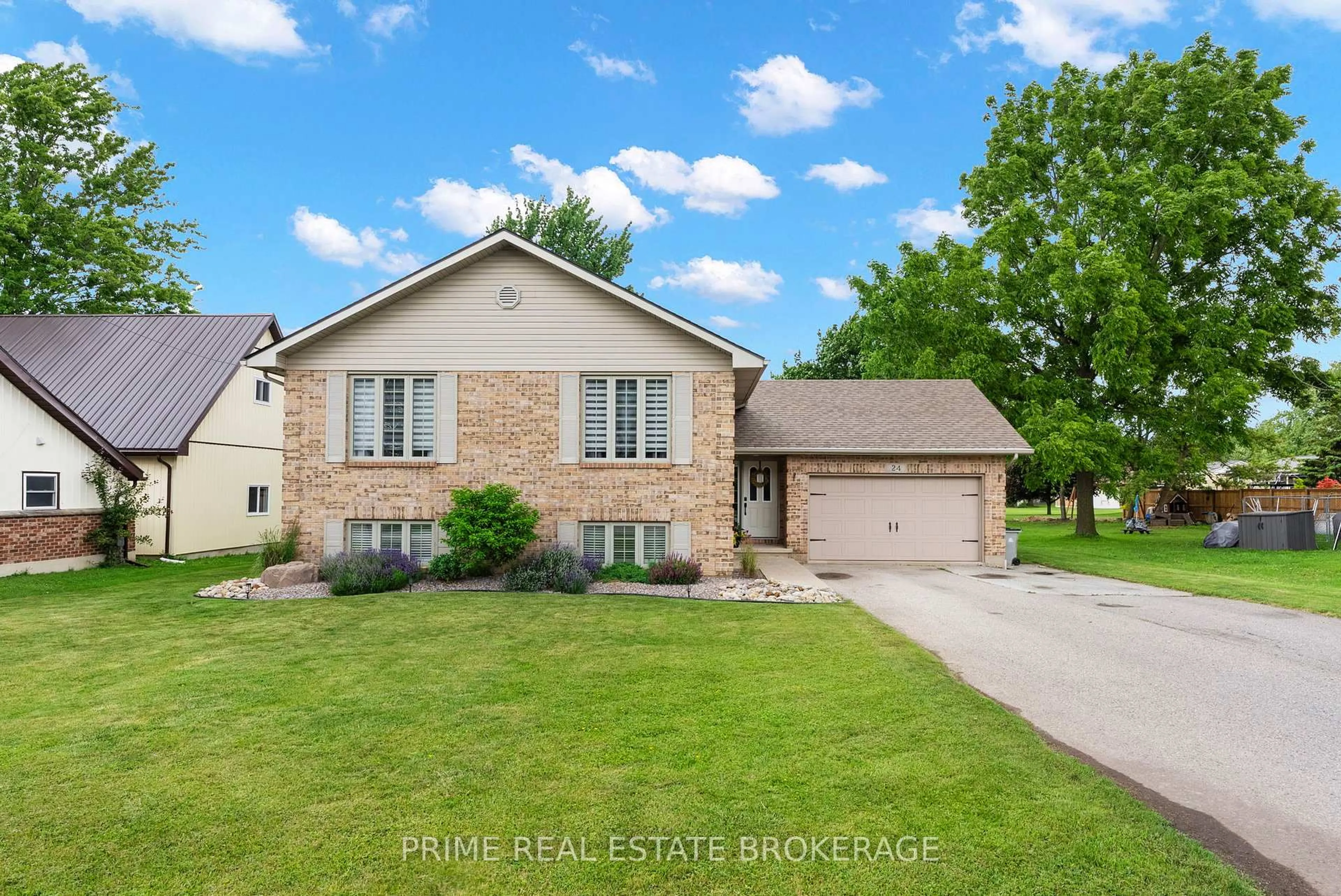 Home with brick exterior material, street for 24 Queen St, Lambton Shores Ontario N0N 1J0