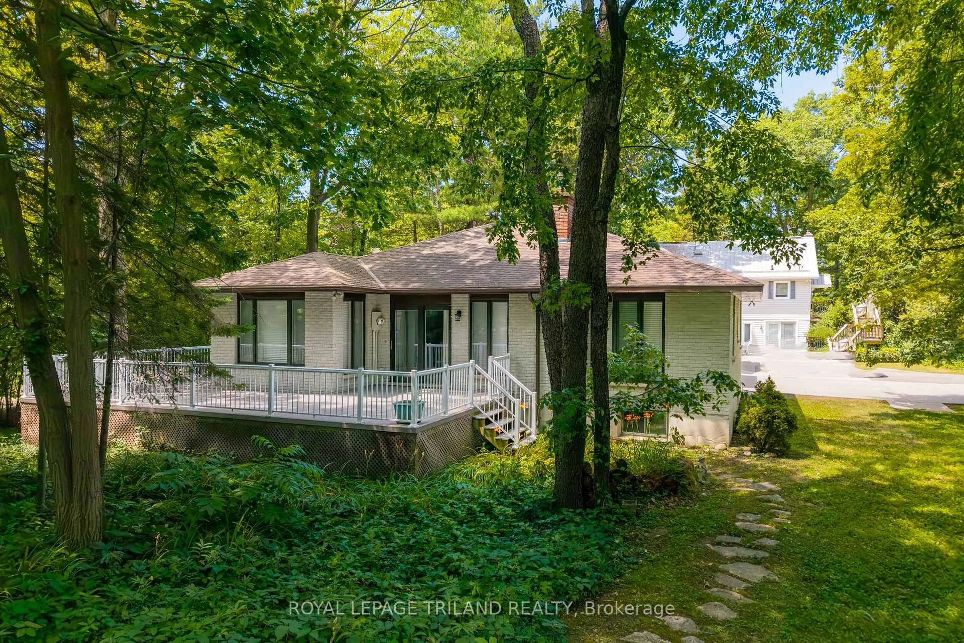 A pic from outside/outdoor area/front of a property/back of a property/a pic from drone, forest/trees view for 33 Forest Ave, South Huron Ontario N0M 1T0