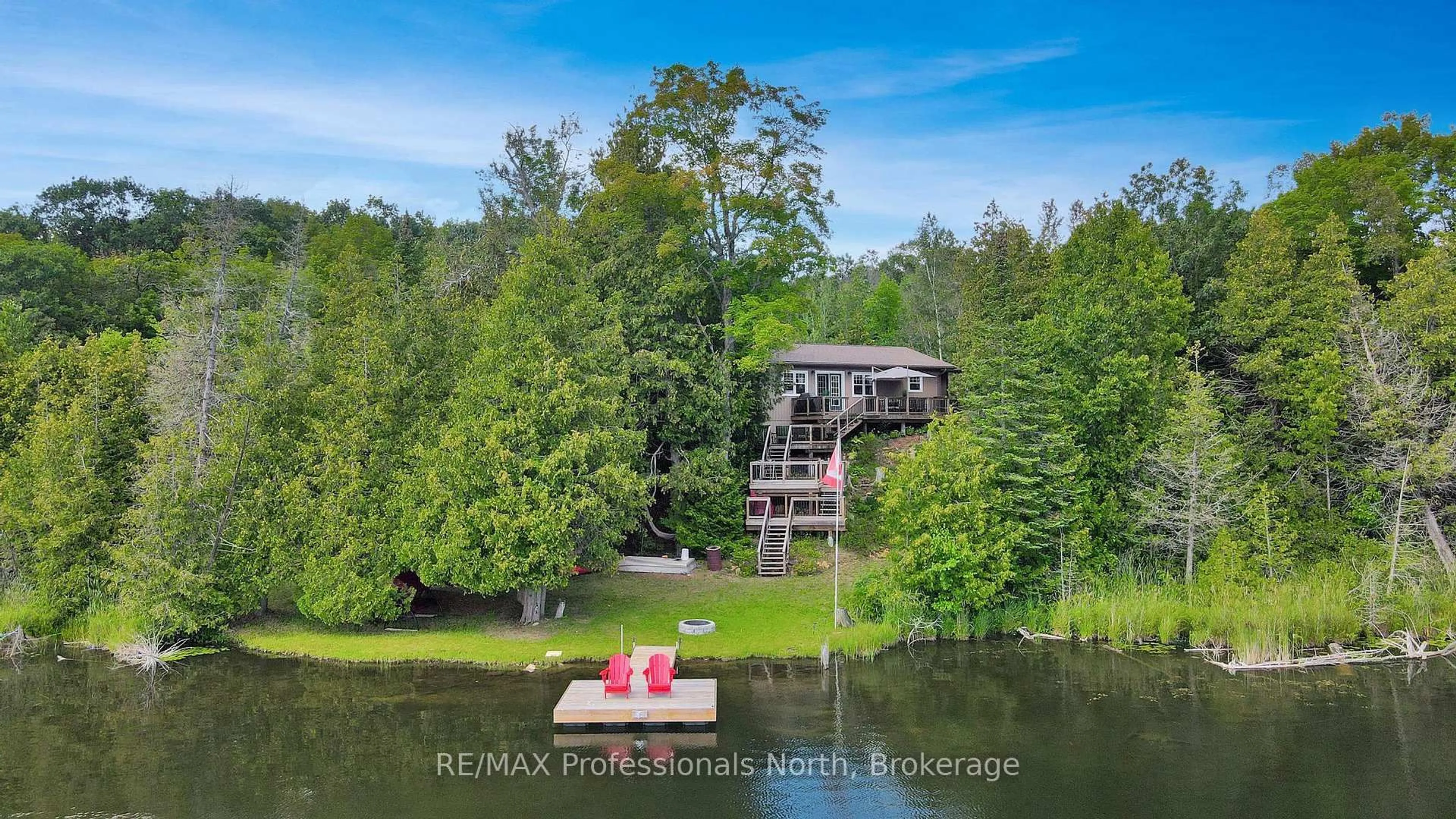 A pic from outside/outdoor area/front of a property/back of a property/a pic from drone, water/lake/river/ocean view for 9390 Highway 35, Minden Hills Ontario K0M 2K0