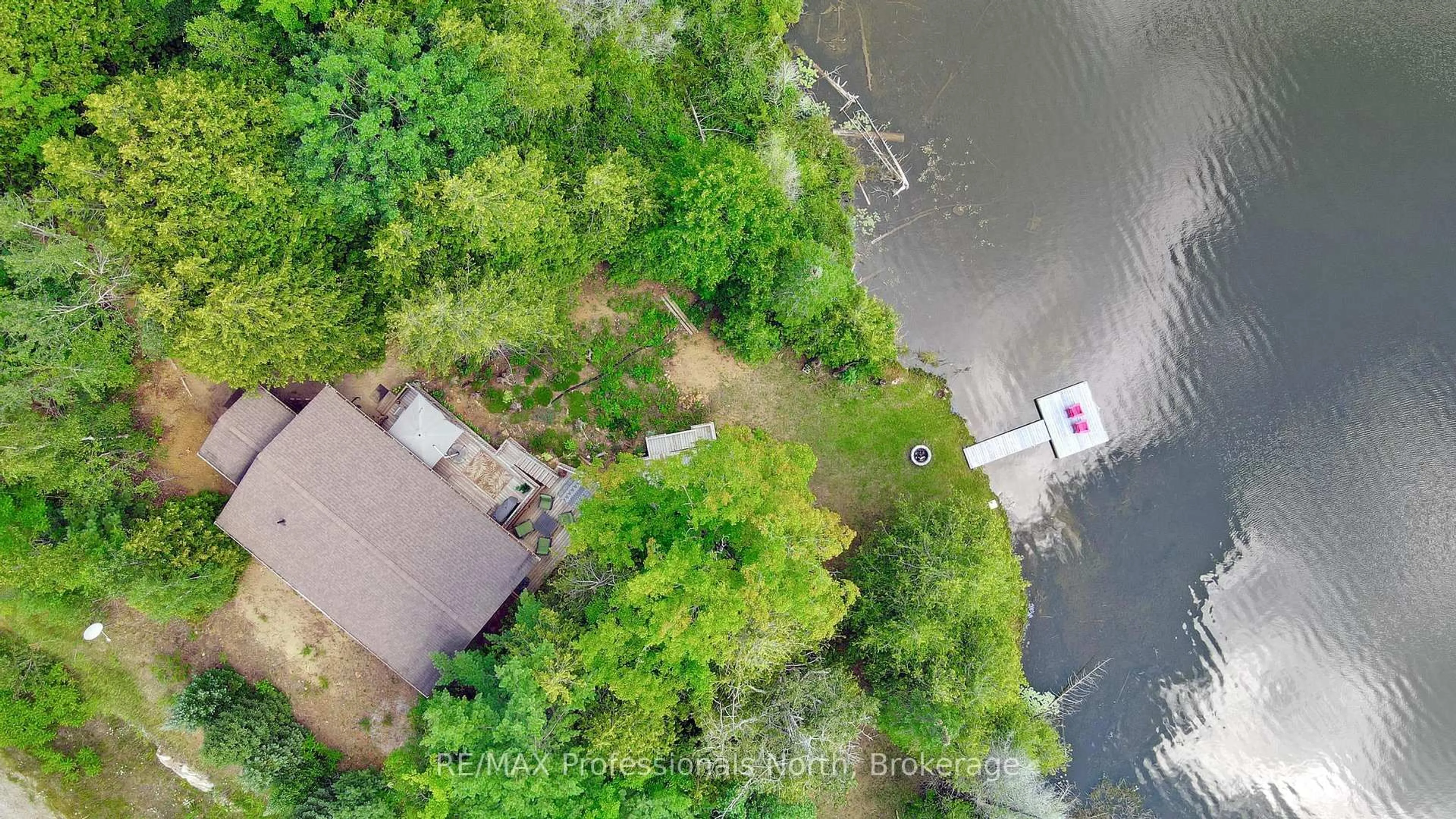 A pic from outside/outdoor area/front of a property/back of a property/a pic from drone, water/lake/river/ocean view for 9390 Highway 35, Minden Hills Ontario K0M 2K0