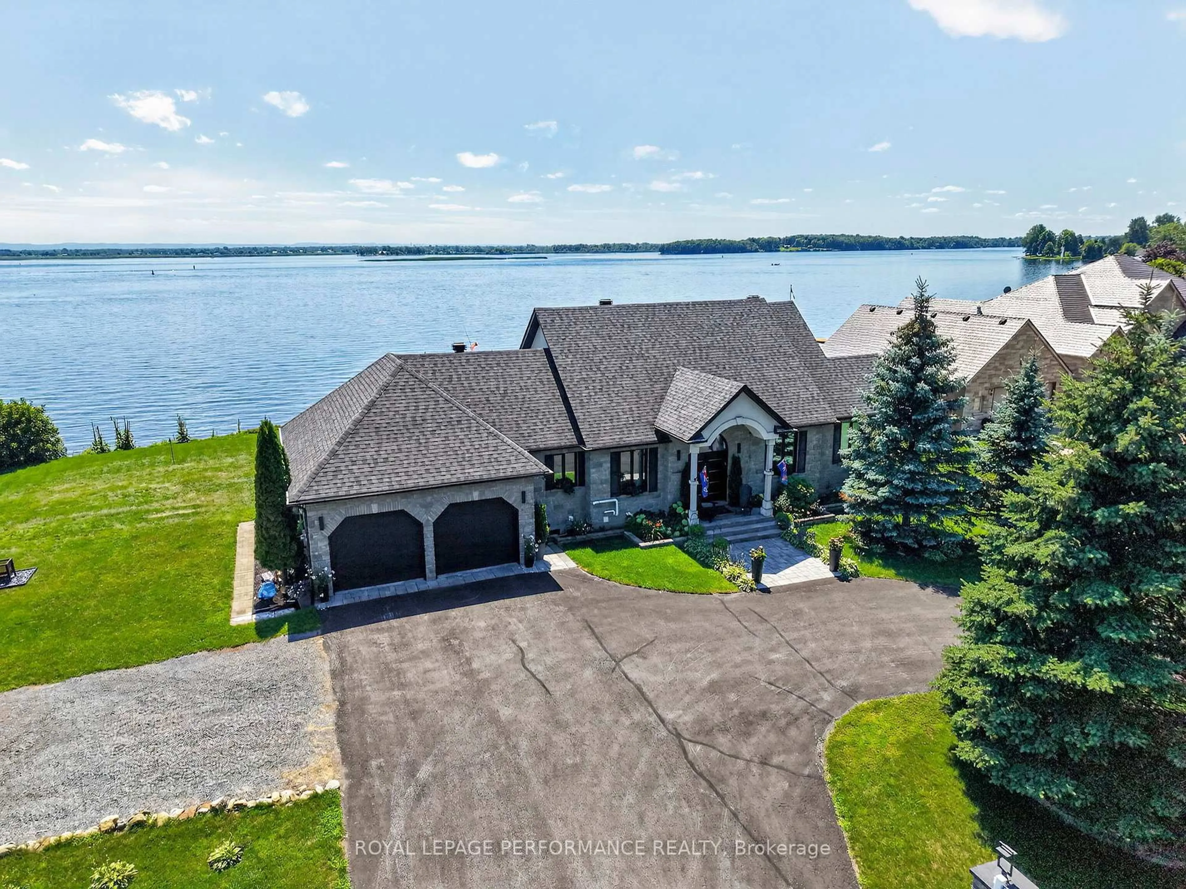 A pic from outside/outdoor area/front of a property/back of a property/a pic from drone, water/lake/river/ocean view for 18734 COUNTY 2 Rd, South Glengarry Ontario K6H 5R5