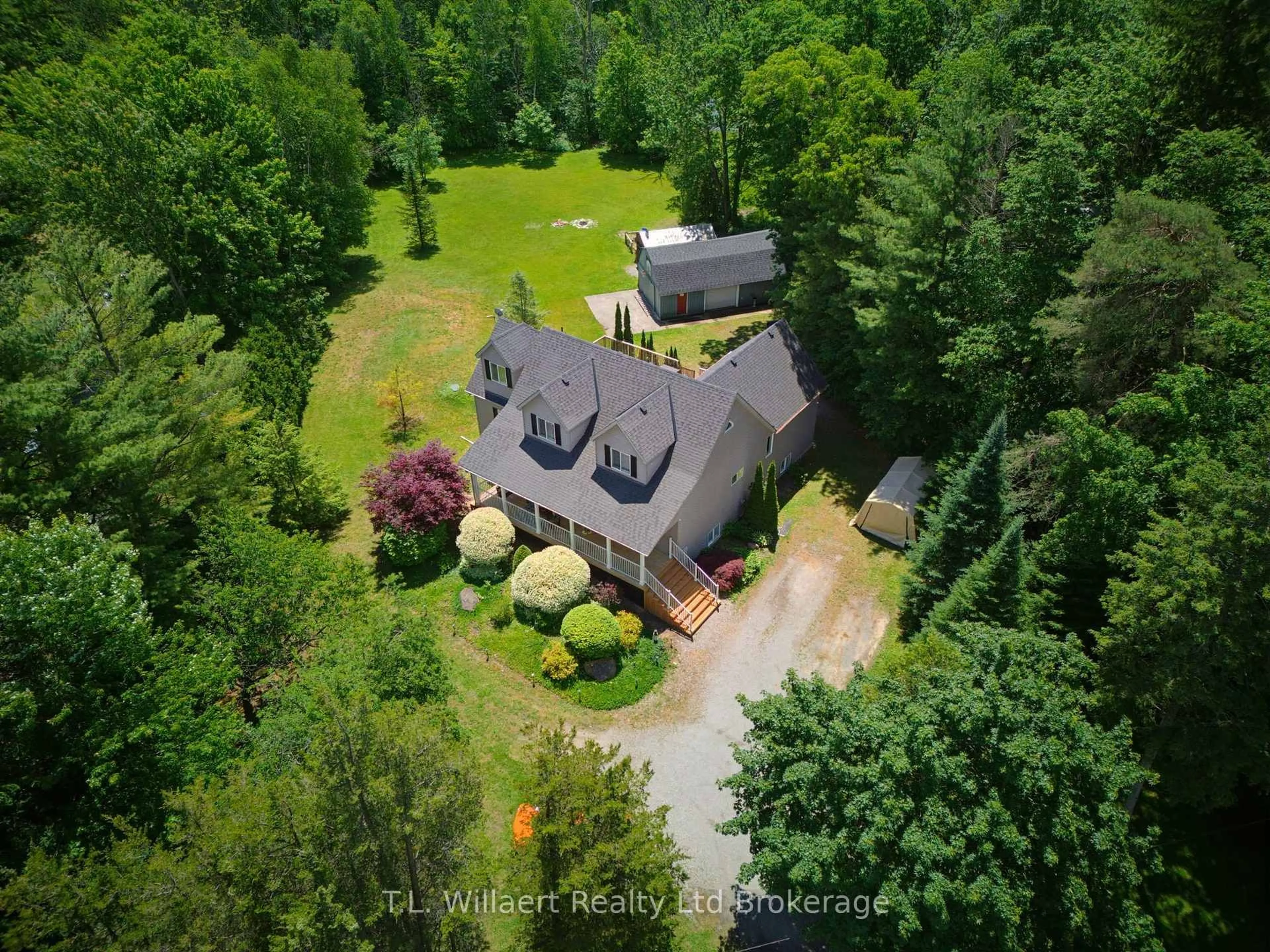 A pic from outside/outdoor area/front of a property/back of a property/a pic from drone, forest/trees view for 1410 Mcdowell Rd, Norfolk Ontario N3Y 4K5