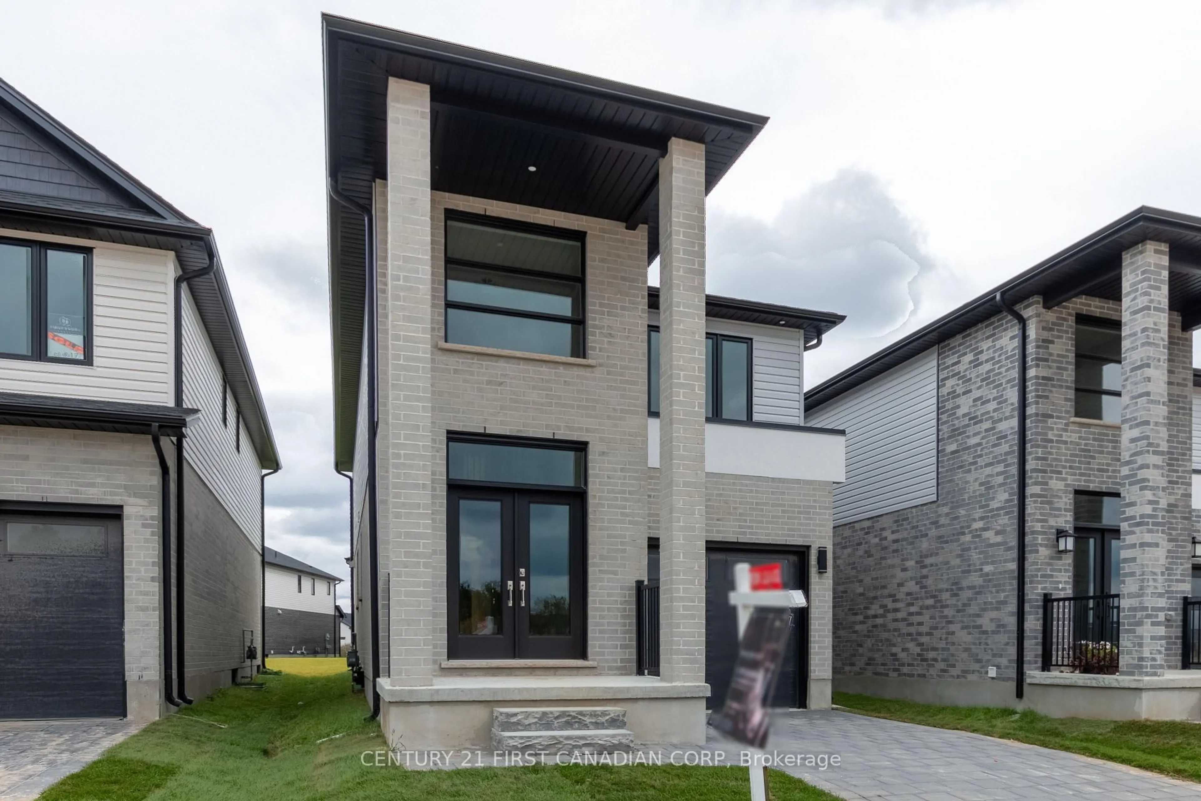 Home with brick exterior material, street for 6453 Royal Magnolia Ave, London South Ontario N6P 0K2