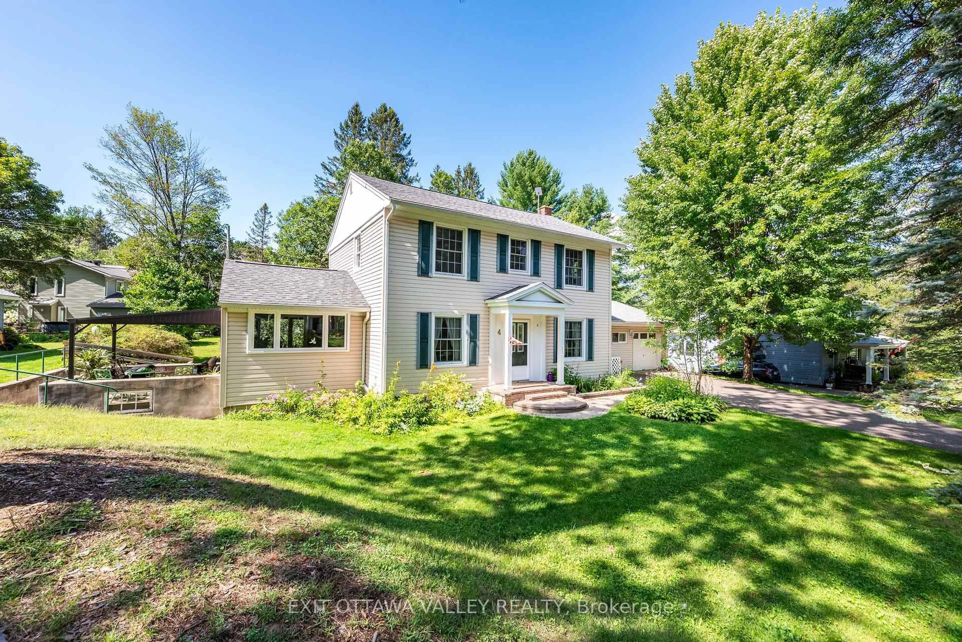 A pic from outside/outdoor area/front of a property/back of a property/a pic from drone, street for 4 MacDonald St, Deep River Ontario K0J 1P0
