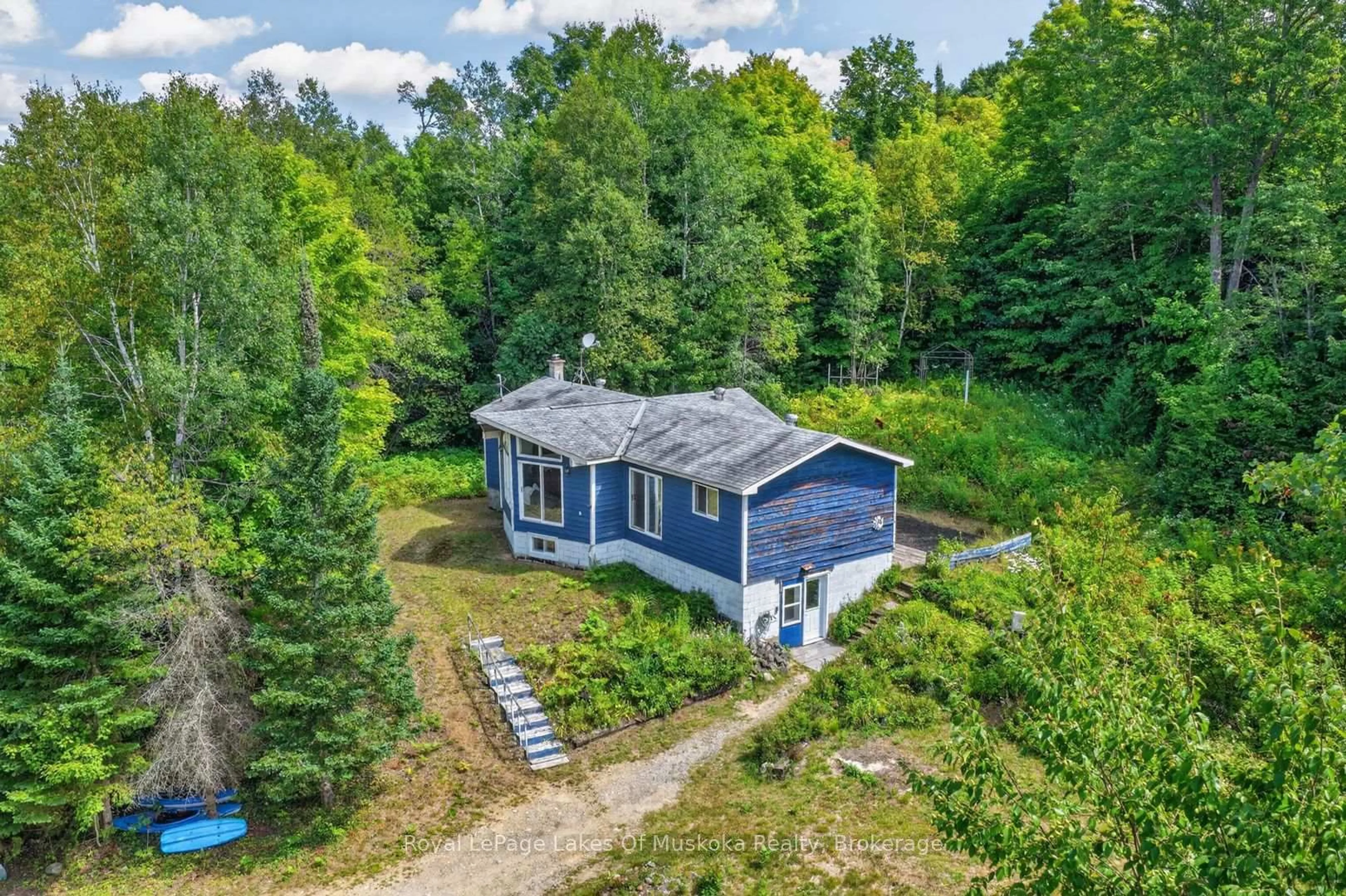 A pic from outside/outdoor area/front of a property/back of a property/a pic from drone, water/lake/river/ocean view for 695 Bay Lake Rd, Perry Ontario P0A 1J0