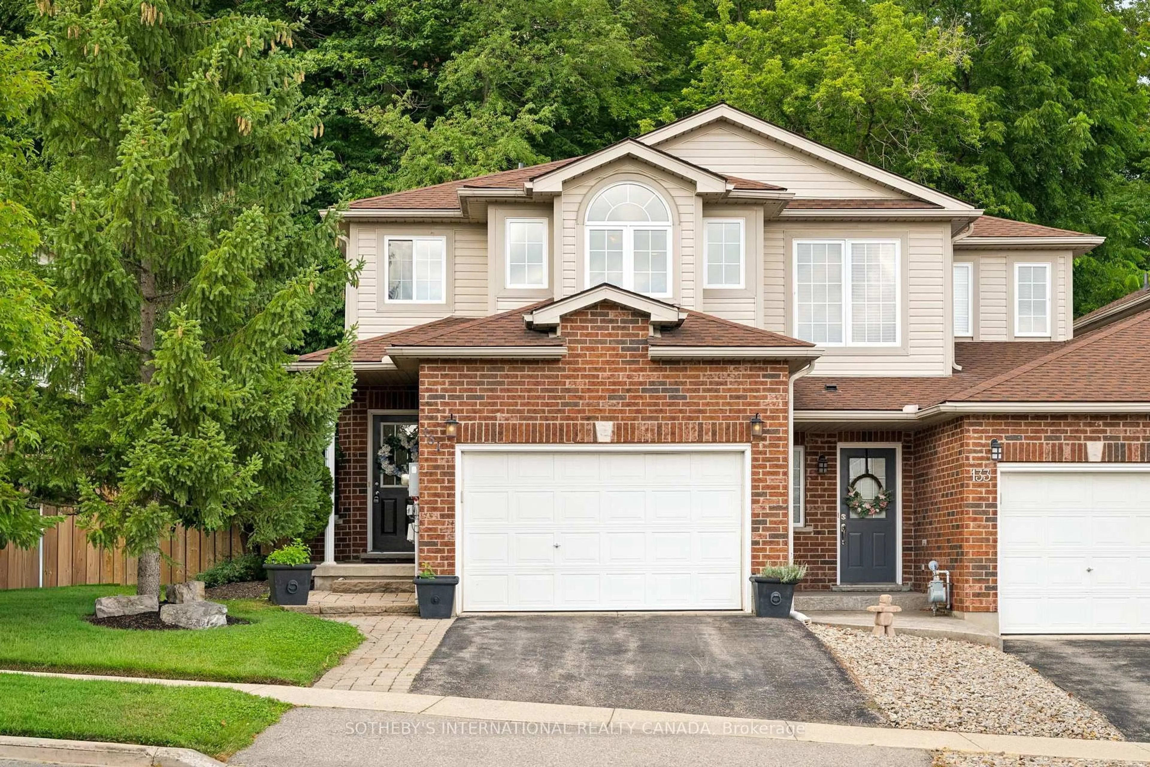 Home with brick exterior material, street for 131 Upper Mercer St, Kitchener Ontario N2A 4N2