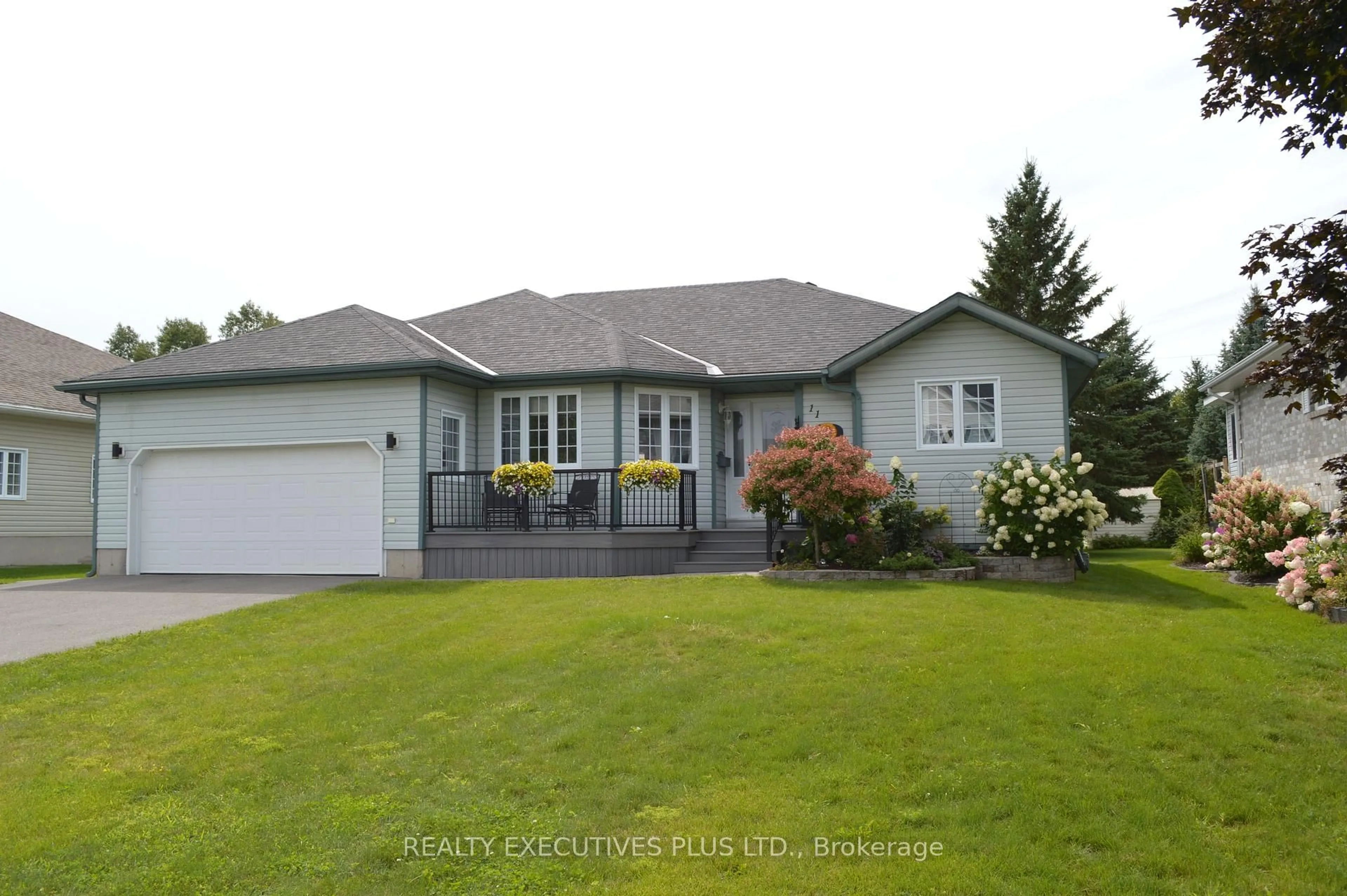 Home with vinyl exterior material, street for 11 Grove St, South Dundas Ontario L8N 1P4