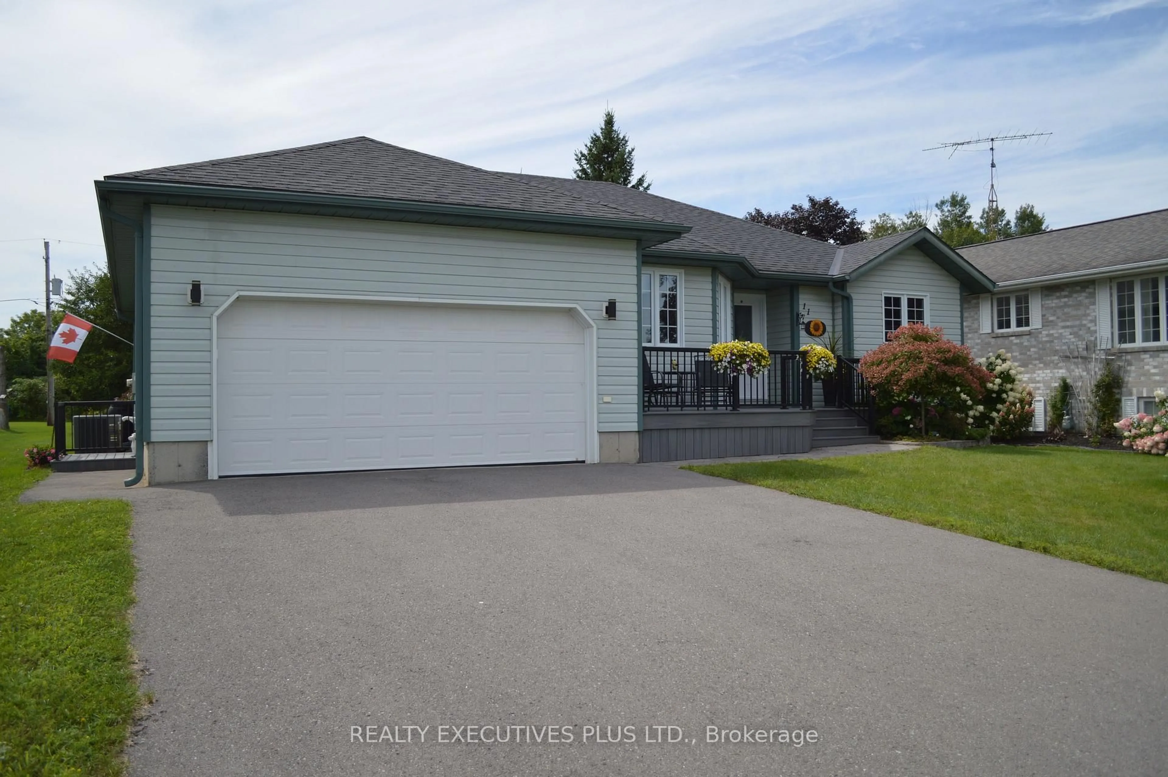 Home with vinyl exterior material, street for 11 Grove St, South Dundas Ontario L8N 1P4
